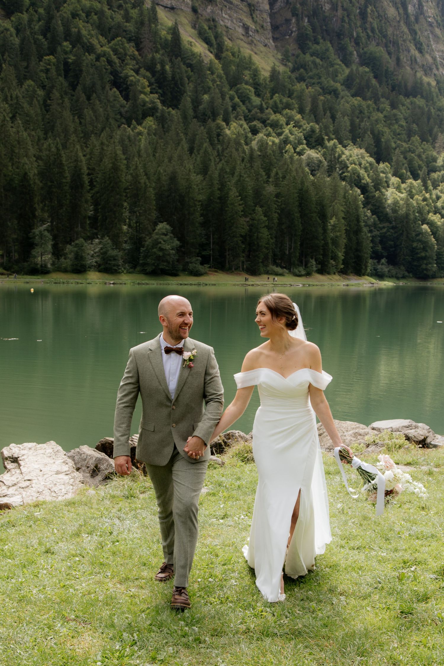 Morzine Wedding photographer captures epic outdoor wedding ceremony photos on Lac Montriond.Candid timeless documentary style photography.