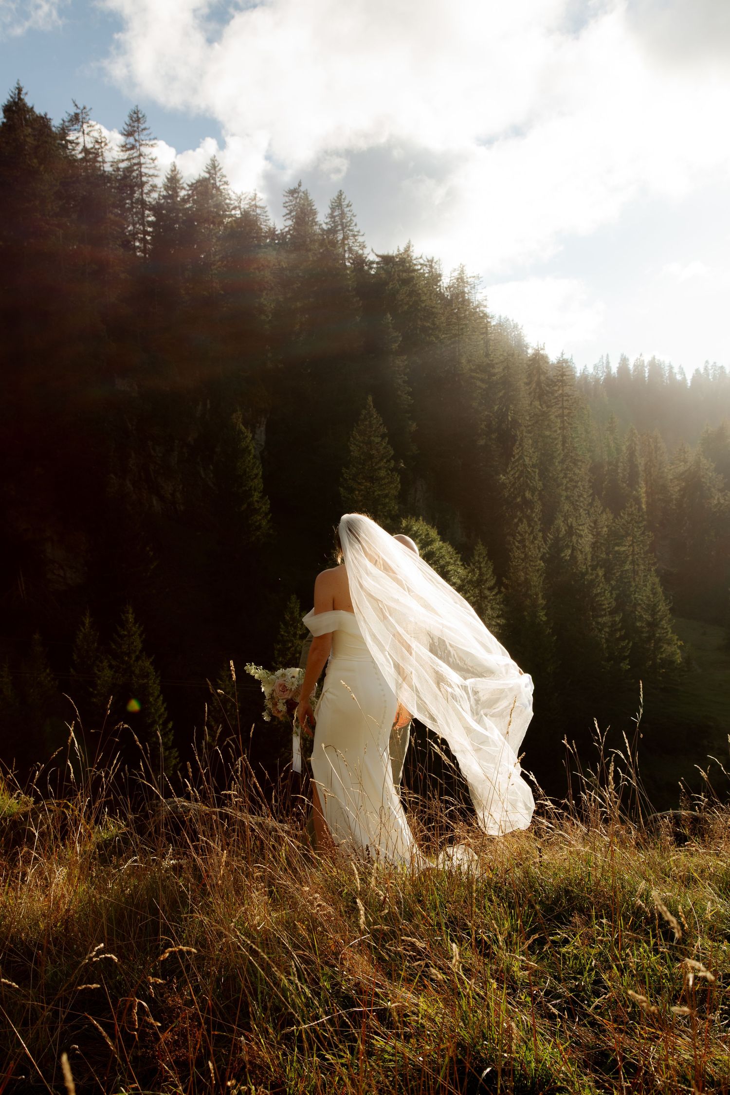 Morzine Wedding photographer captures epic wedding photos with Mountains & Lake Montriond backdrop. Candid timeless documentary style photos