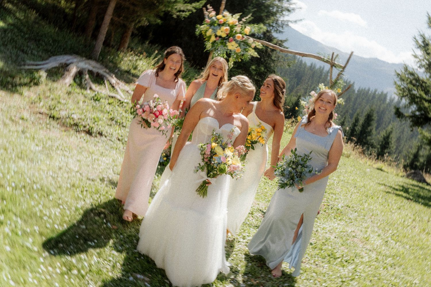 Morzine Wedding Photographer captures candid ceremony photo at Meribel Wedding venue.Natural,honest &authentic storytelling. Three Valleys