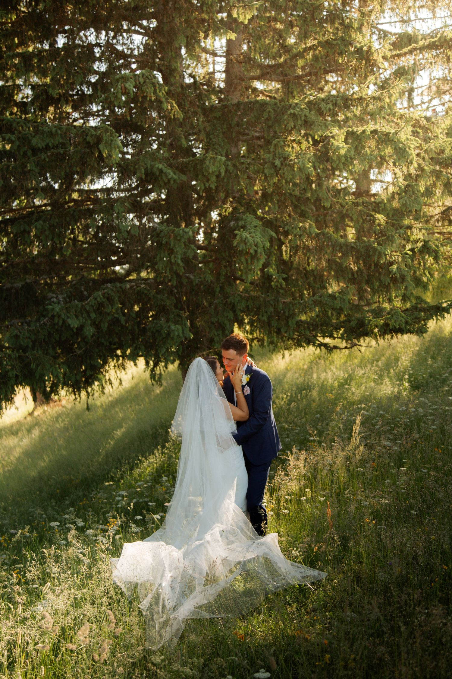 Morzine Wedding Photographer captures bride and groom photos in La Clusaz Wedding venue. French Mountain Wedding photographer. Outdoor Bride