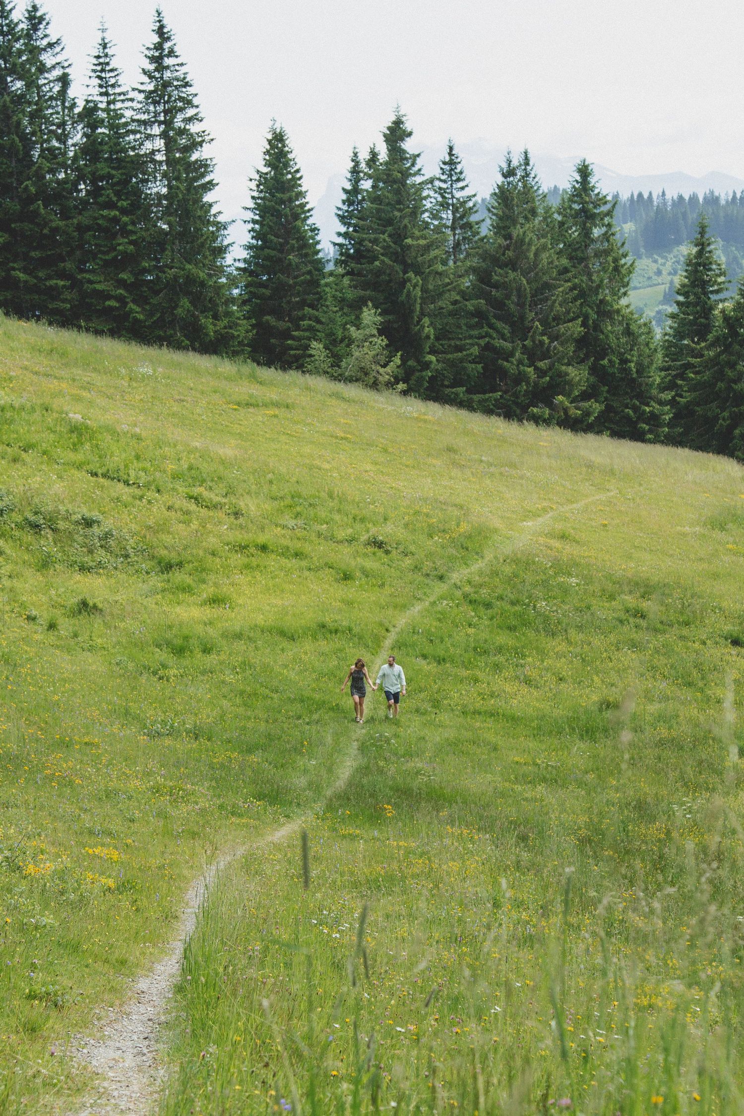 Engagement photos taken by documentary style wedding photographer in Morzine, France. French Wedding Venue. Wedding photography inspiration.