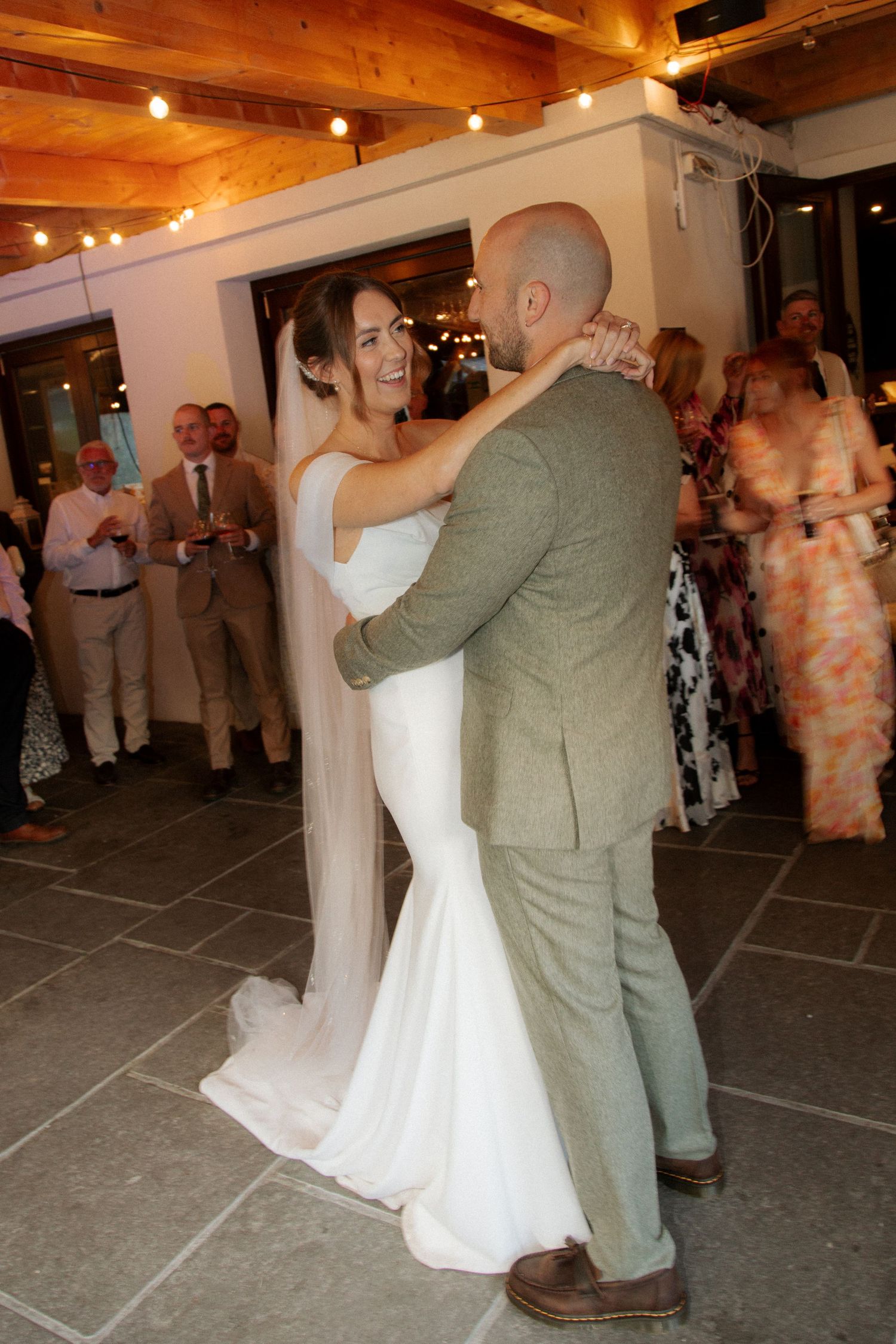 Morzine Wedding photographer captures wedding party dancing at montriond wedding venue. Candid timeless documentary style photos.Flash photo