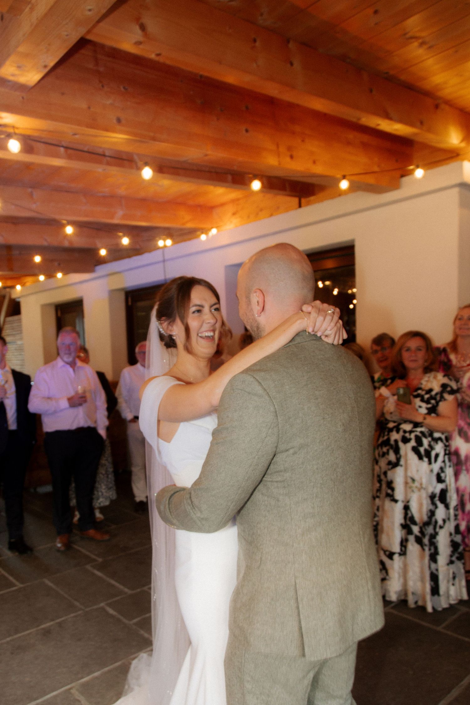Morzine Wedding photographer captures flash photos of wedding party at Montriond Wedding Venue, Lake Montriond.Candid timeless documentary.