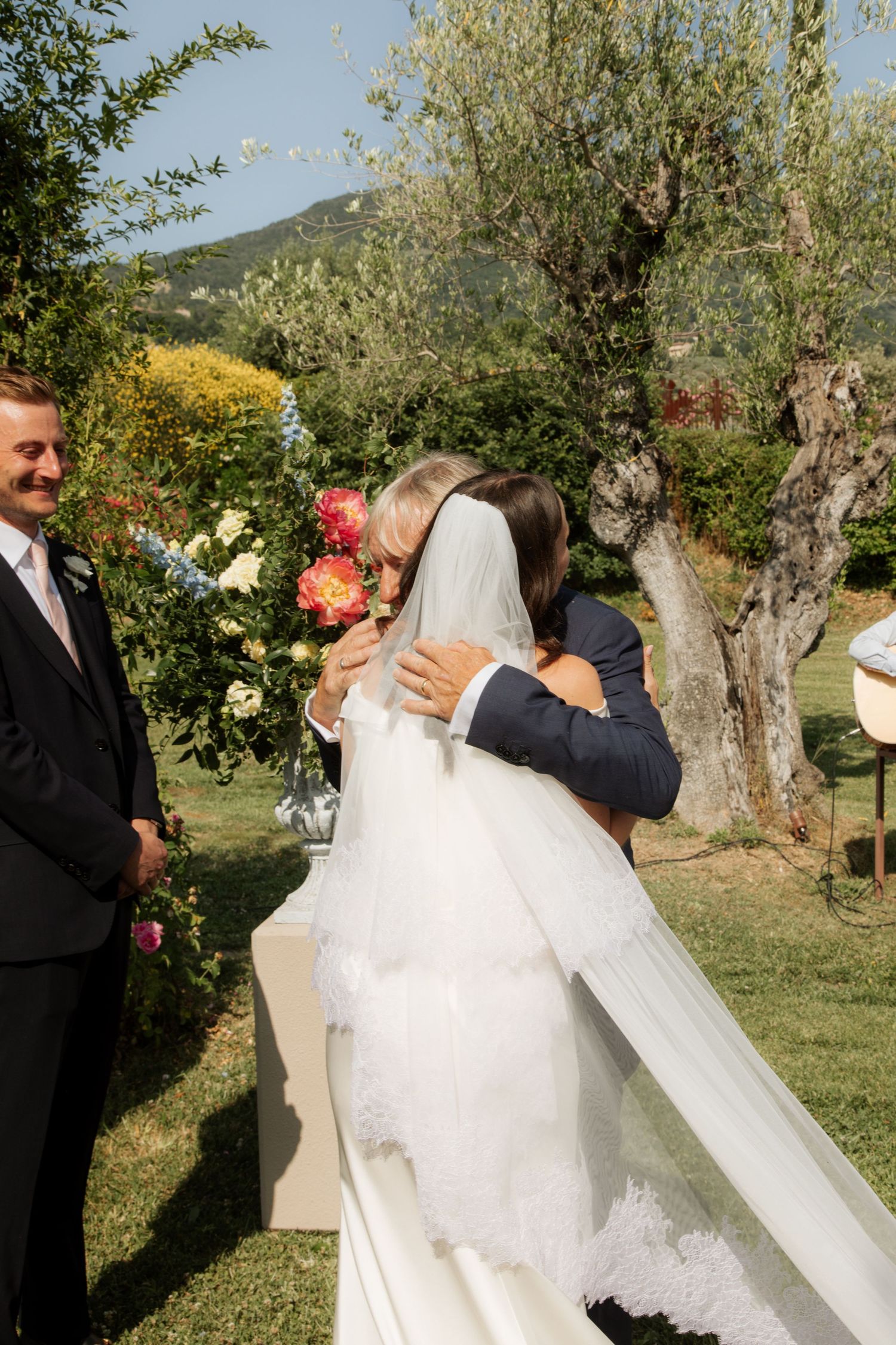 Assisi Wedding ceremony in Italy captured by destination wedding photographer, candid, natural style. Documentary style wedding photography.