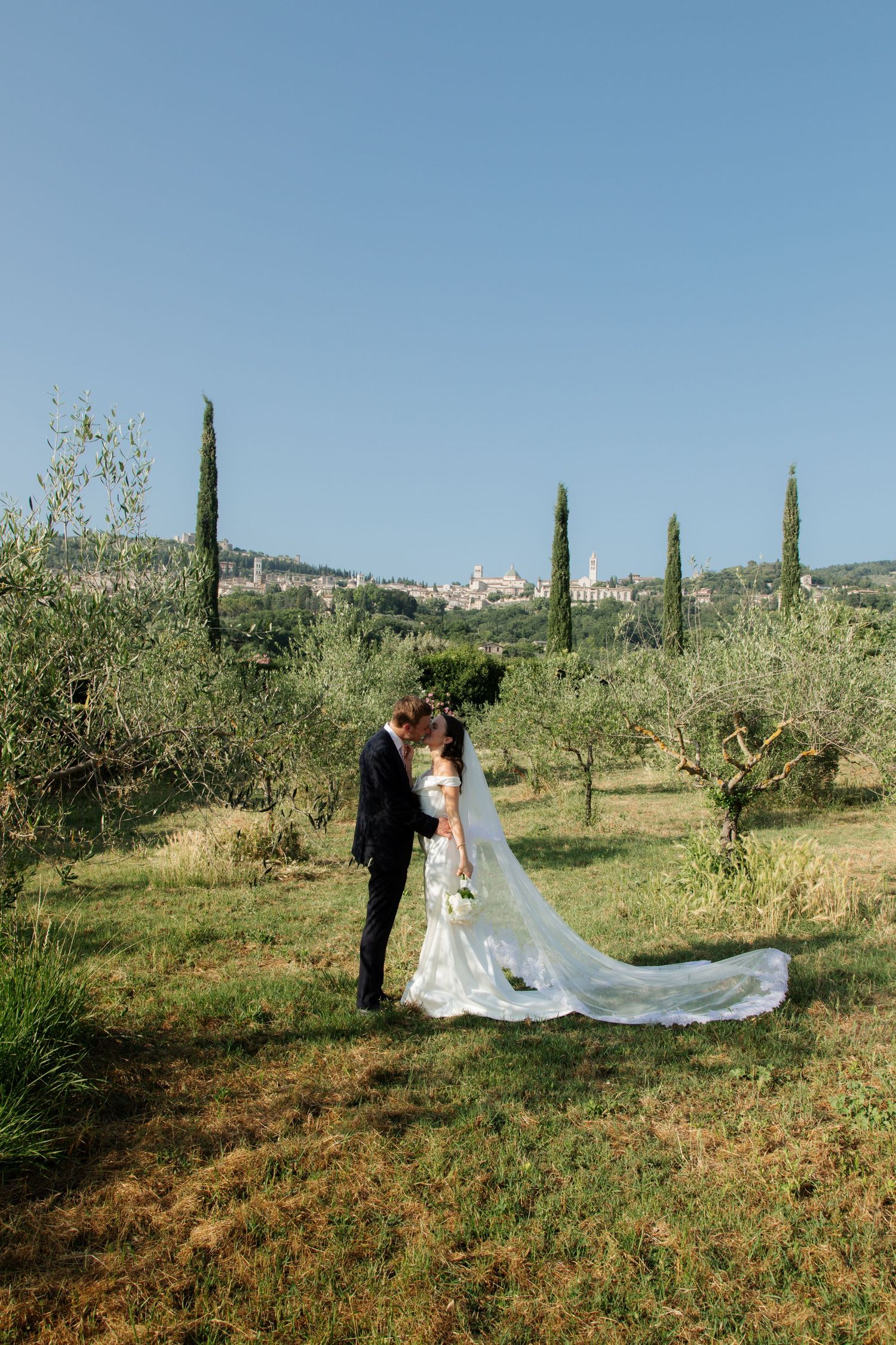 Italian Wedding photos in Assisi captured by destination wedding photographer, candid, natural style. Documentary style wedding photography.