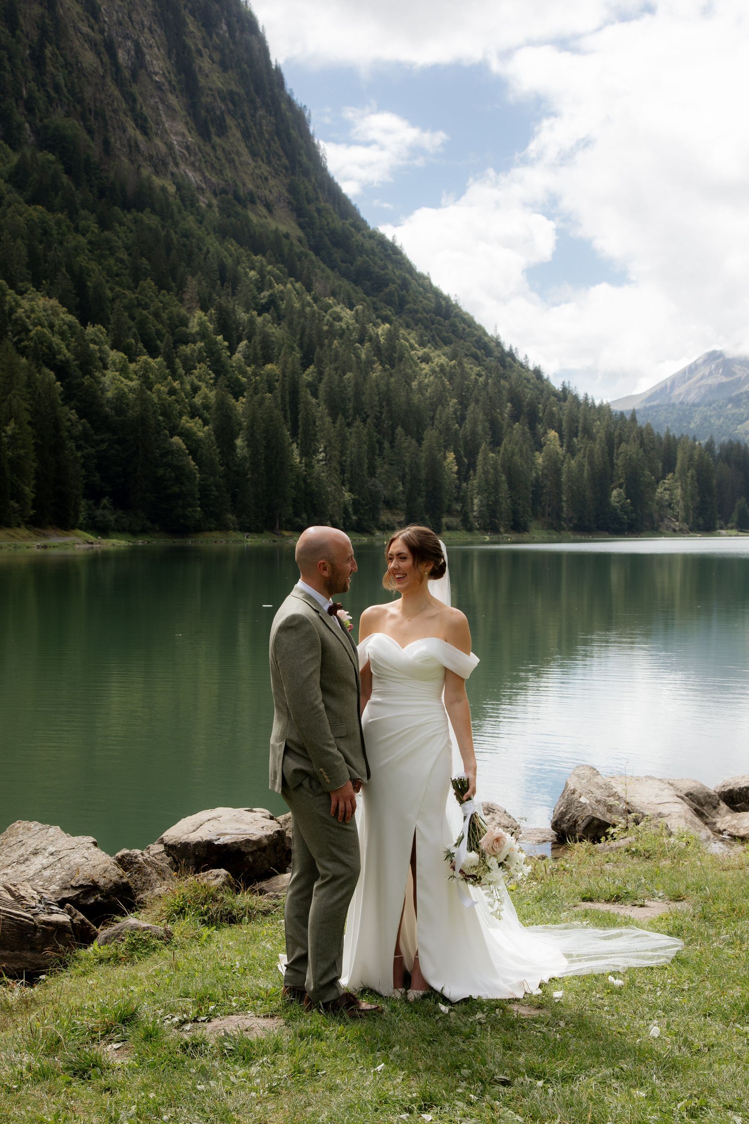 Morzine Wedding photographer captures epic outdoor wedding ceremony photos on Lac Montriond.Candid timeless documentary style photography.