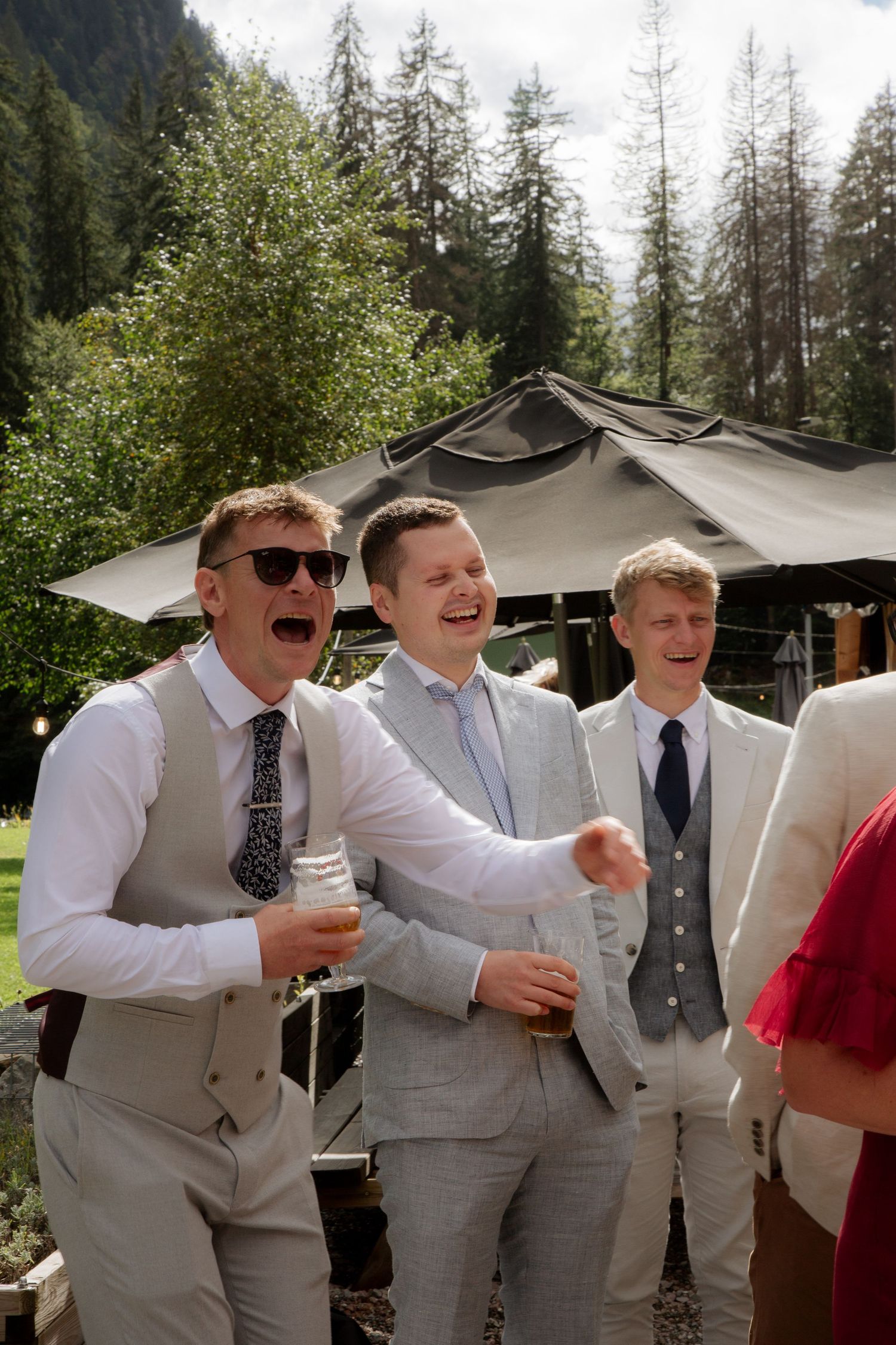Morzine Wedding photographer captures flash photos of wedding party at Montriond Wedding Venue, Lake Montriond.Candid timeless documentary
