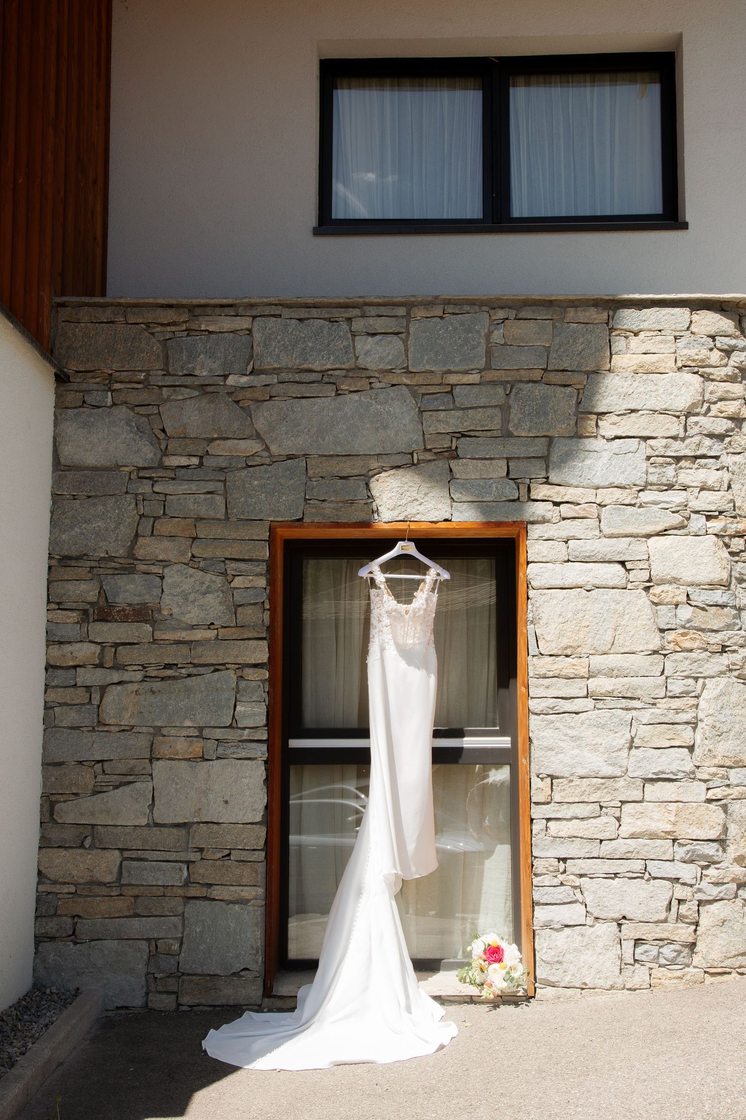 Candid Wedding Photographer captures bridal detail photo. La Clusaz Wedding venue. French Alps Mountain Wedding photographer. Outdoor Bride