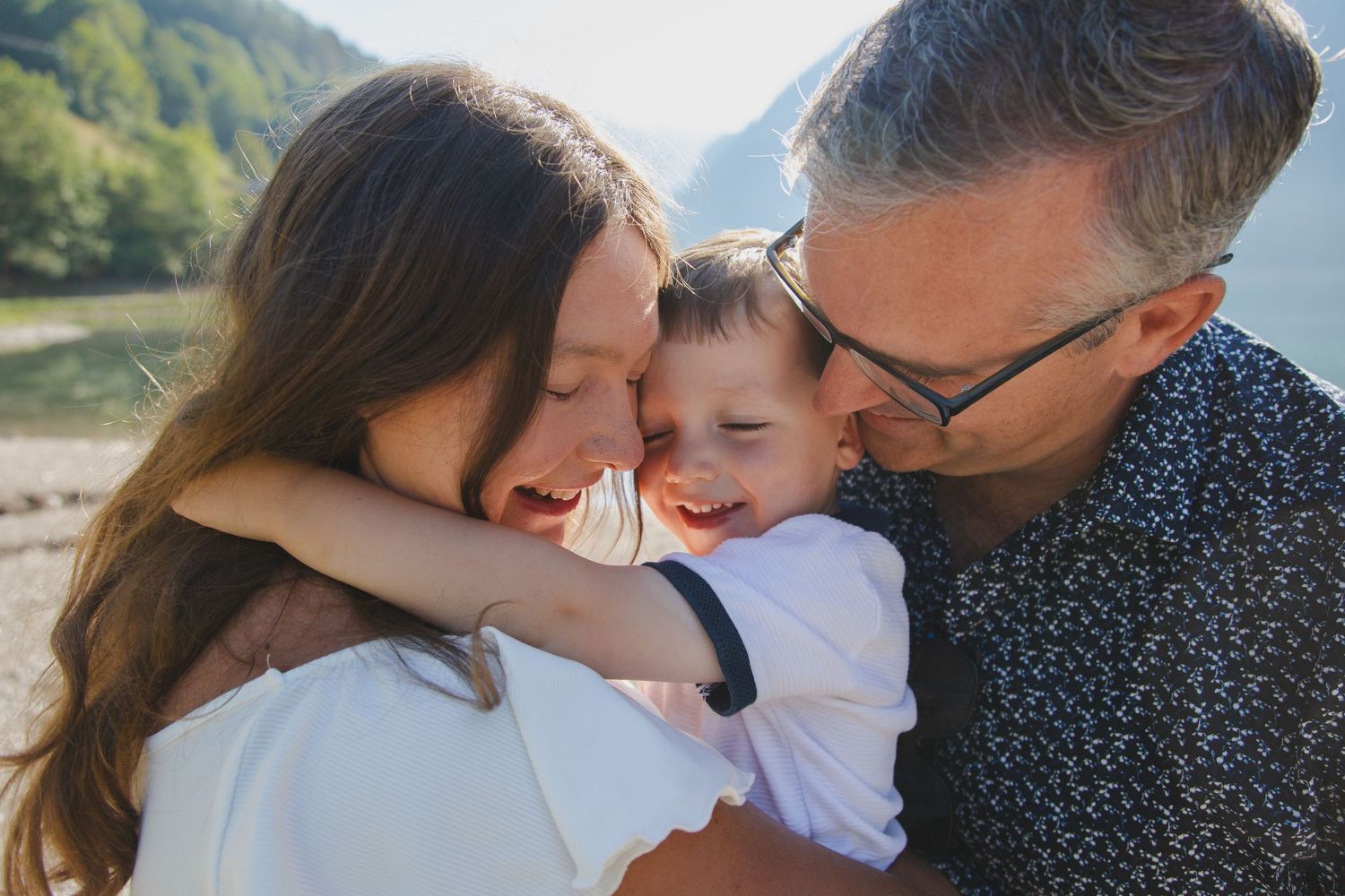 Outdoor family photography session next to Lake Montriond. Captured by Morzine Family photographer. Natural family portraits in morzine