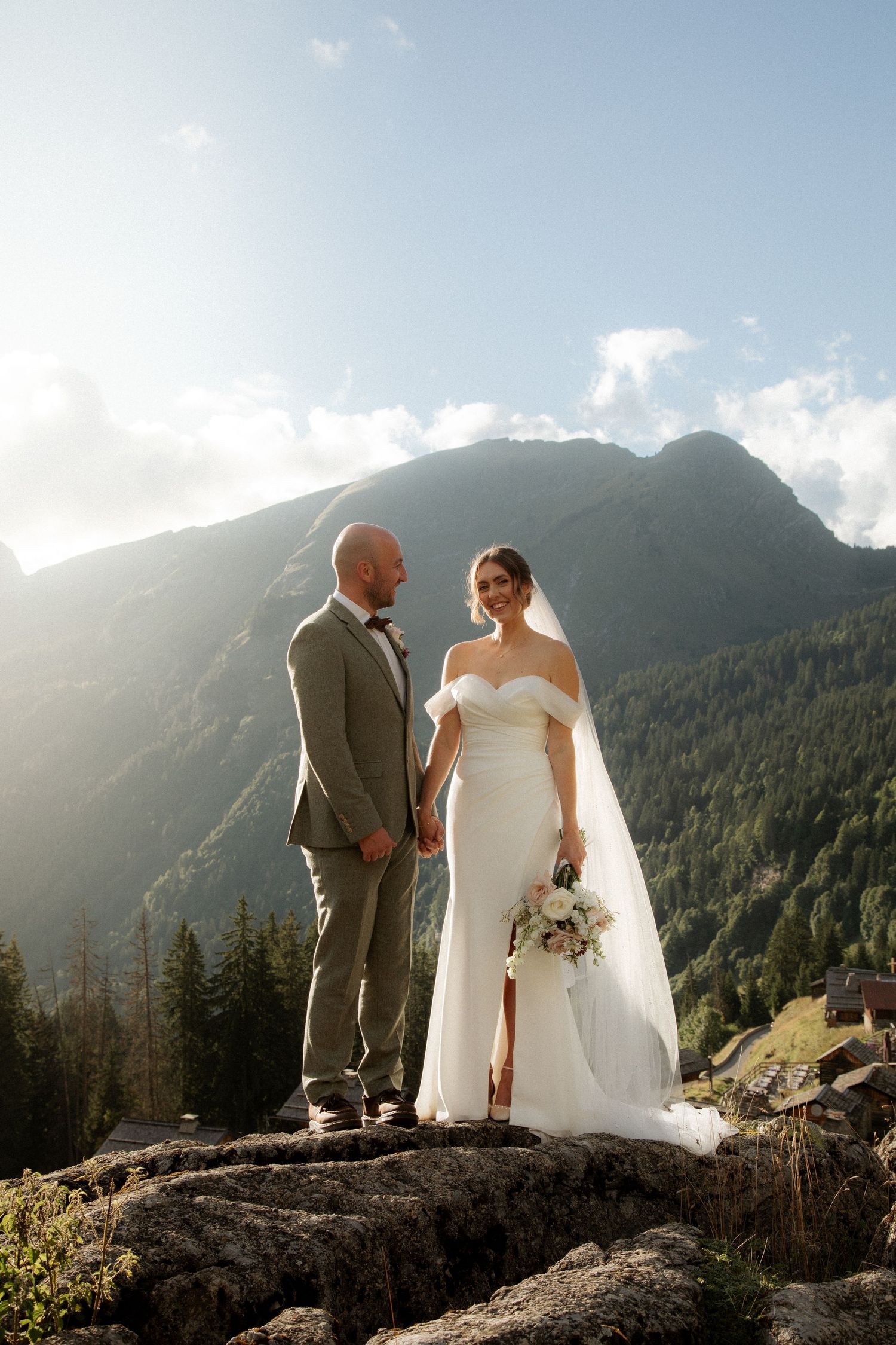 Morzine Wedding Photographer cpatures golden hour couples photo at a Montriond Wedding Venue. Natural, honest & authentic storytelling
