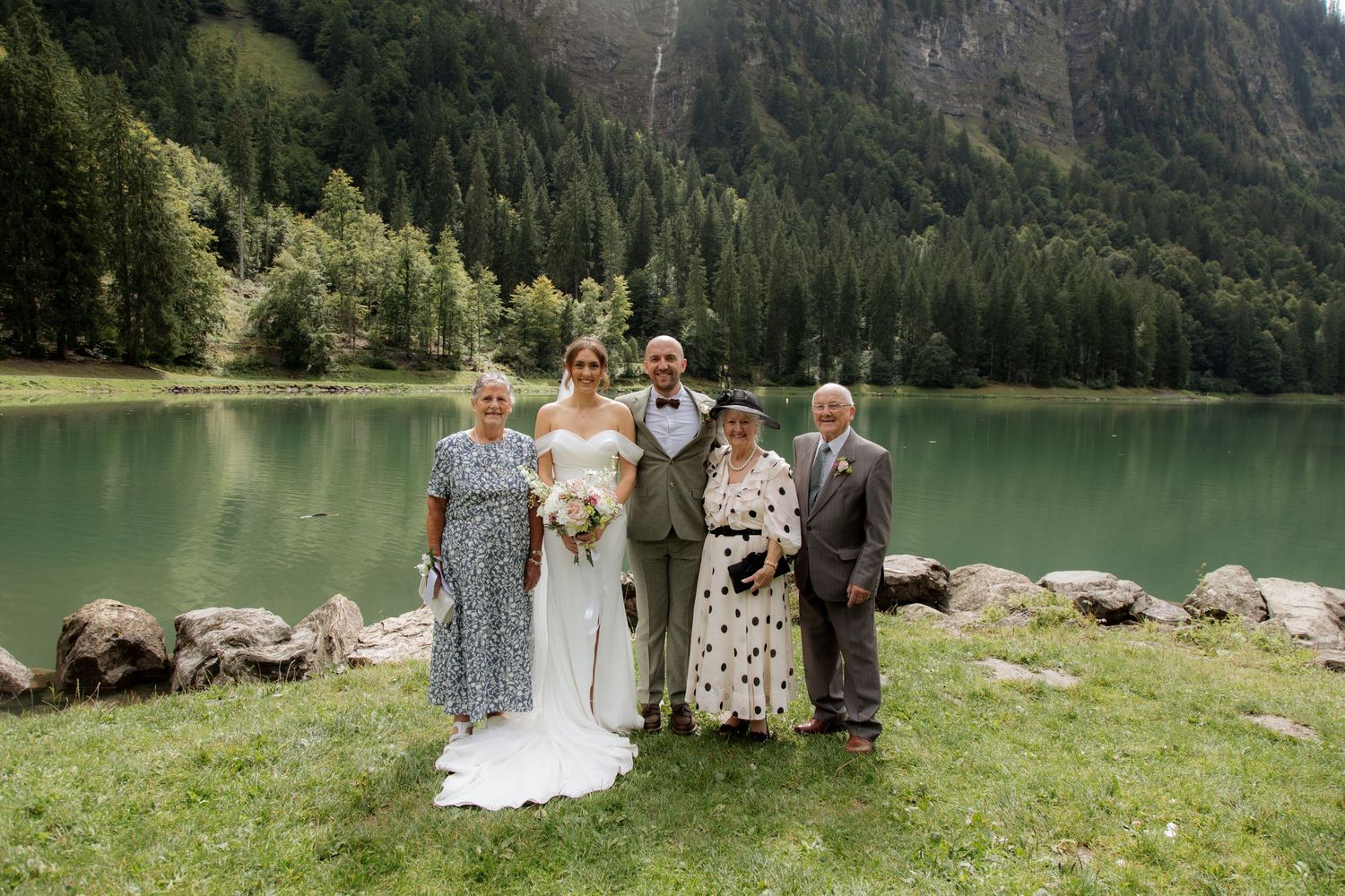 Morzine Wedding photographer captures intimate wedding cermeony photos on Lac Montriond. Candid timeless documentary style photography.