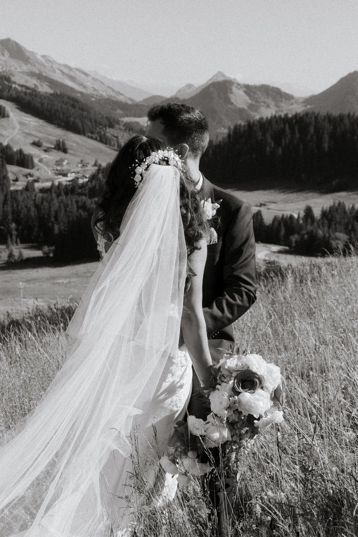 Morzine Wedding Photographer captures bride and groom photos in La Clusaz Wedding venue. French Mountain Wedding photographer. Outdoor Bride