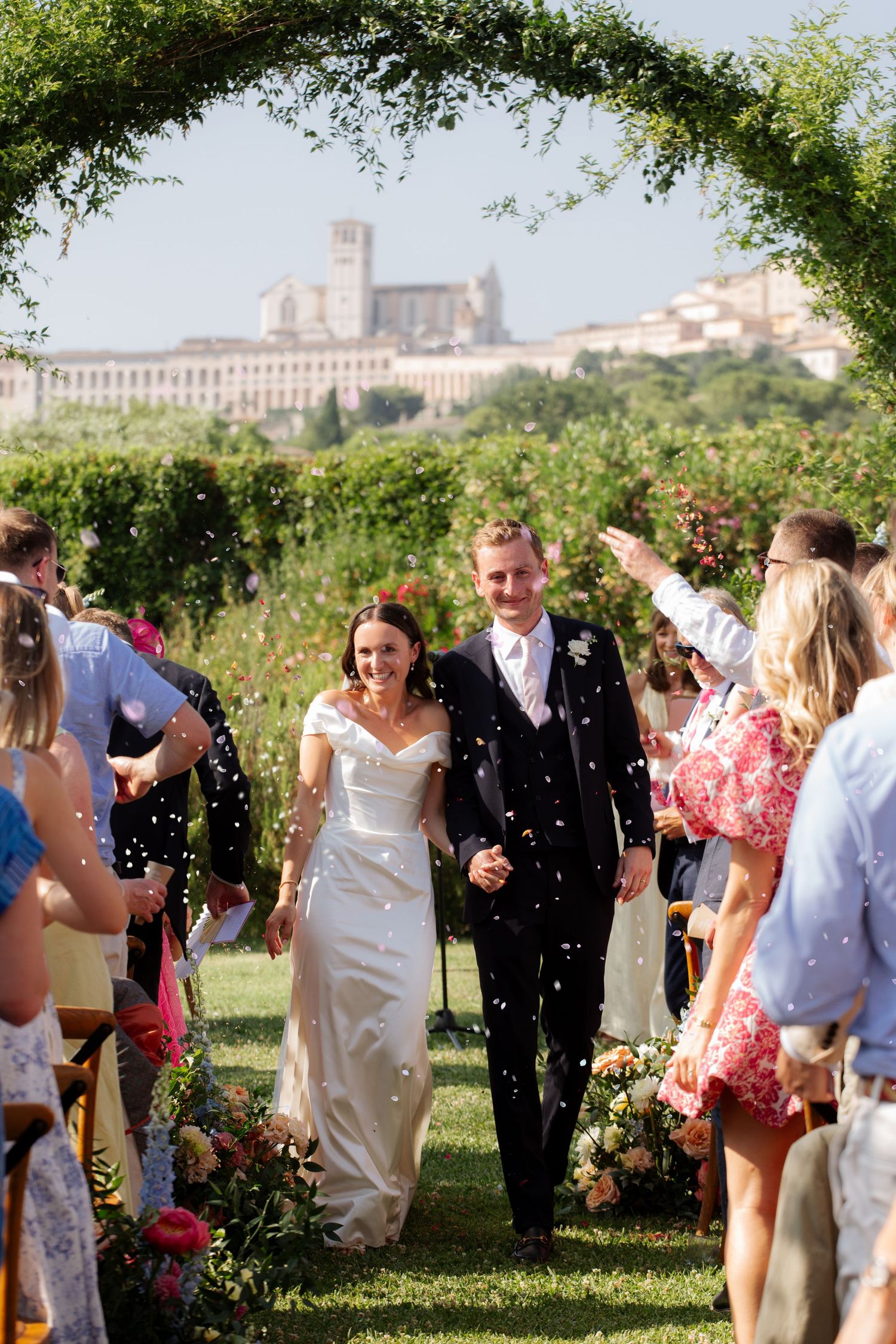 Italian Wedding photos in Assisi captured by destination wedding photographer, candid, natural style. Documentary style wedding photography.