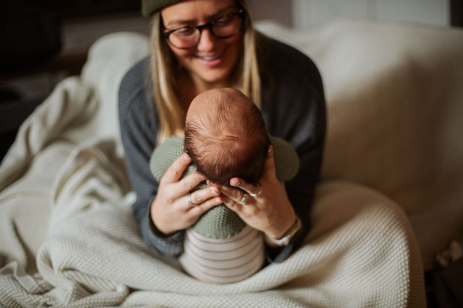 Newborn Photographer captures maternity photos of mother and baby. Newborn photography session captured by Morzine newborn Photographer