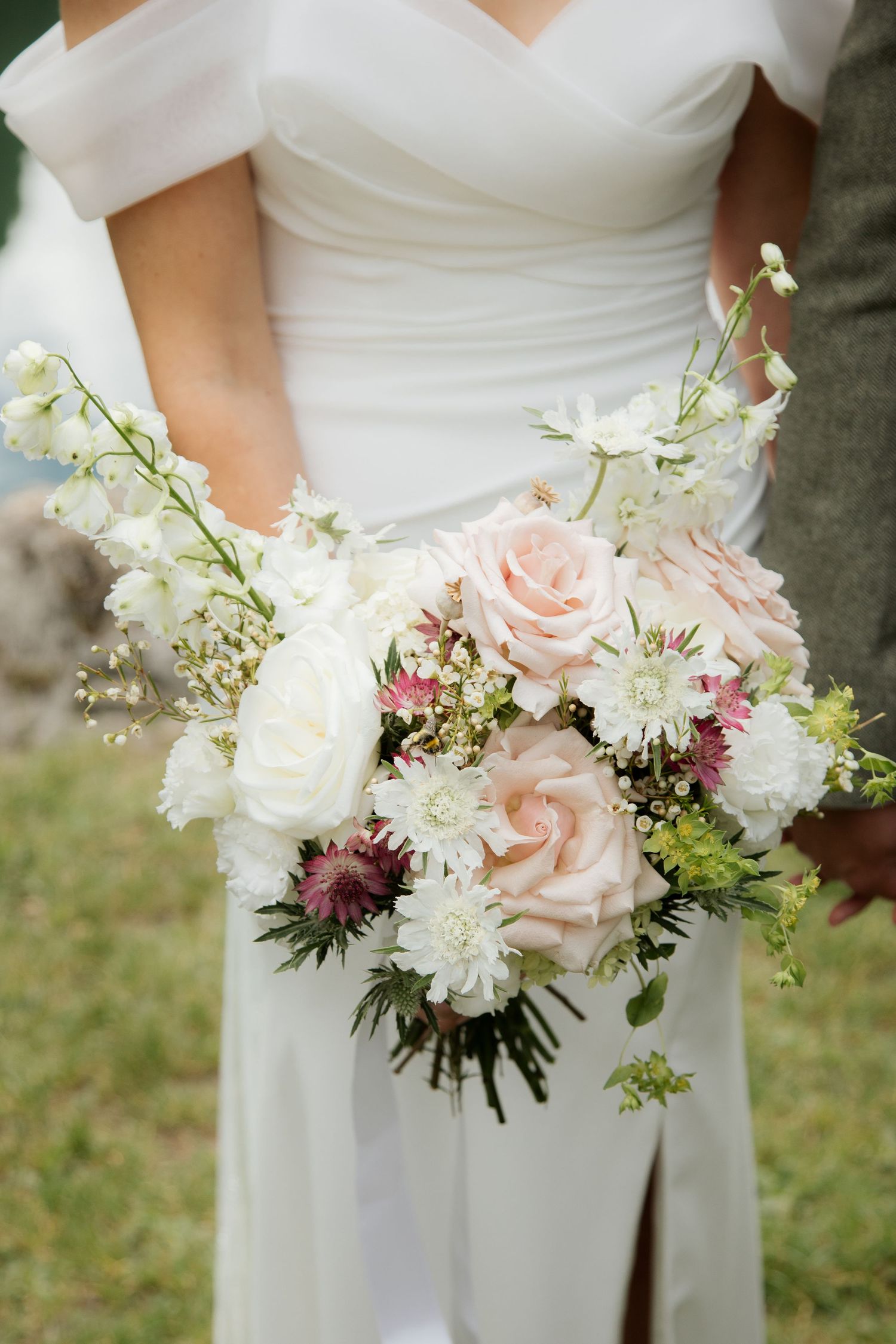 Morzine Wedding photographer captures outdoor wedding confetti photos on Lac Montriond. Candid timeless documentary style photography.