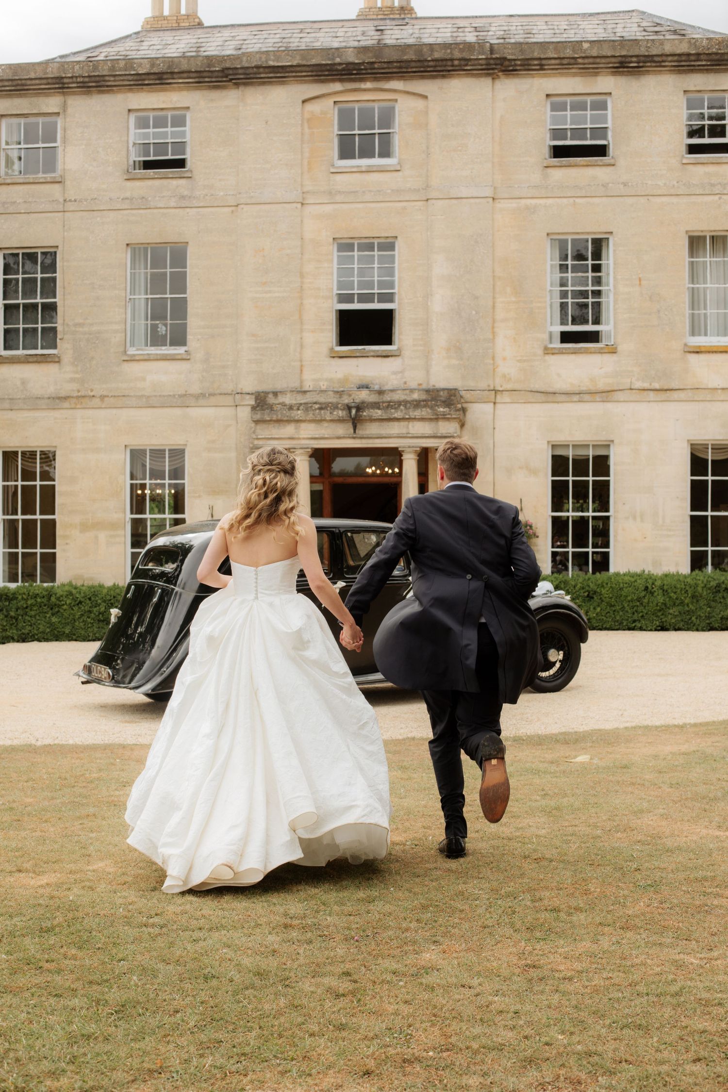 Documentary Style Cotswold Wedding Photographer captures wedding photos Gloucestershire Wedding Venue. Natural, candid wedding photography.