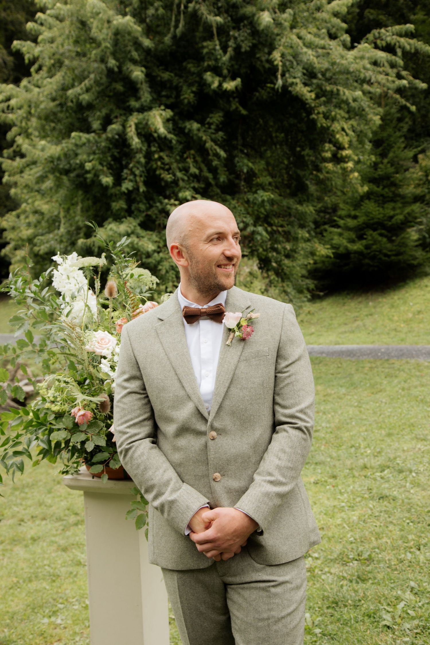 Morzine Wedding photographer captures outdoor wedding cermeony photo on Lac Montriond. Candid timeless documentary style photography.