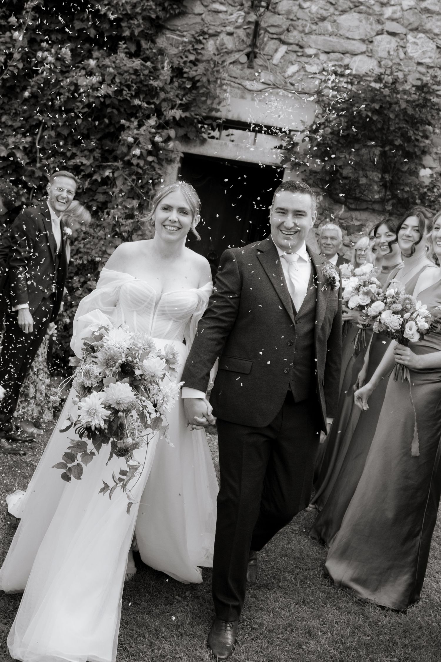Morzine Wedding photographer captures epic confettie and real emotions in Morzine Wedding Venue. Candid,timeless documentary style photos