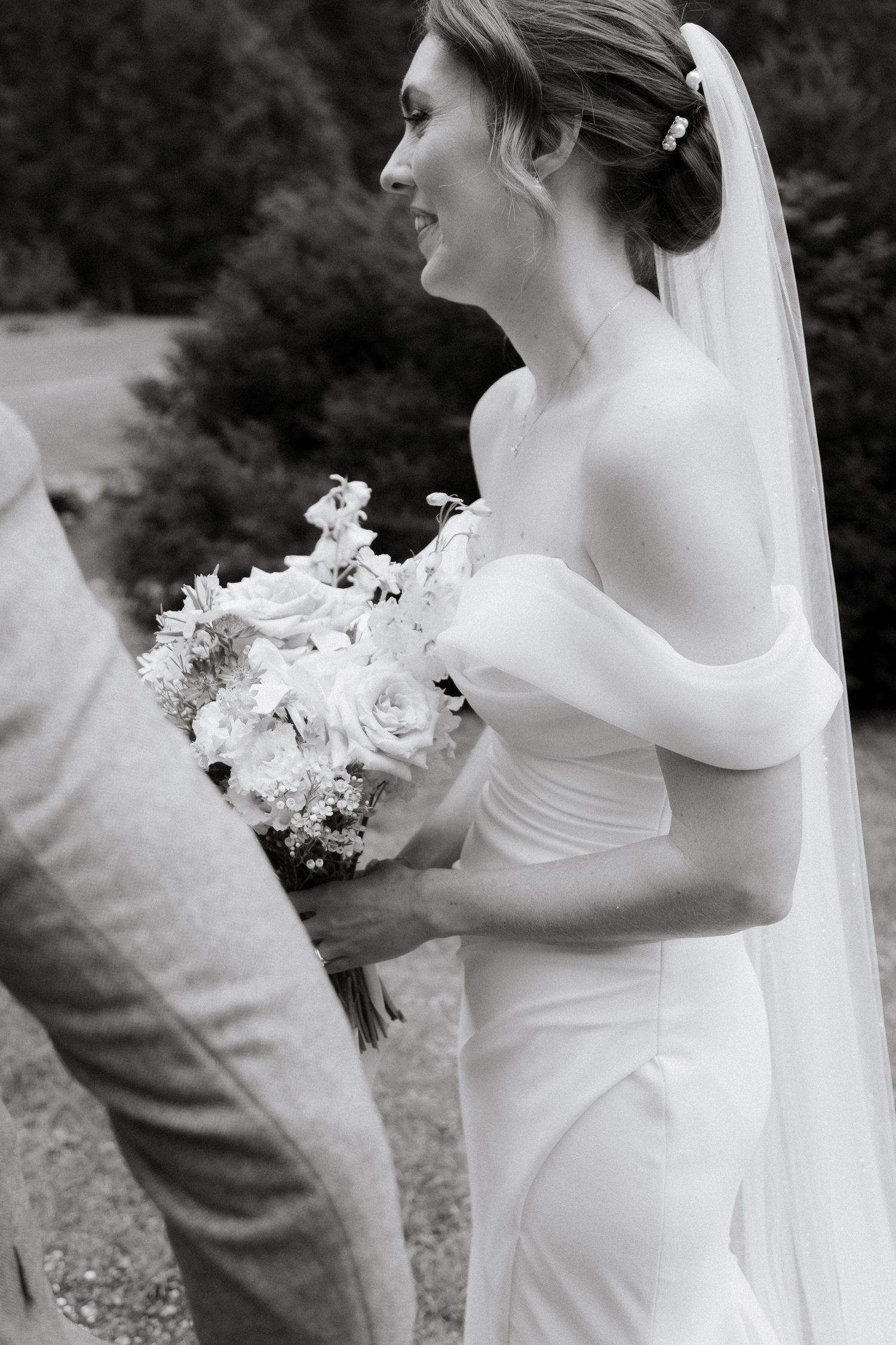Documentary style wedding photo captured by Morzine Wedding Photographer at an outdoor wedding venue. Natural and candid wedding photo