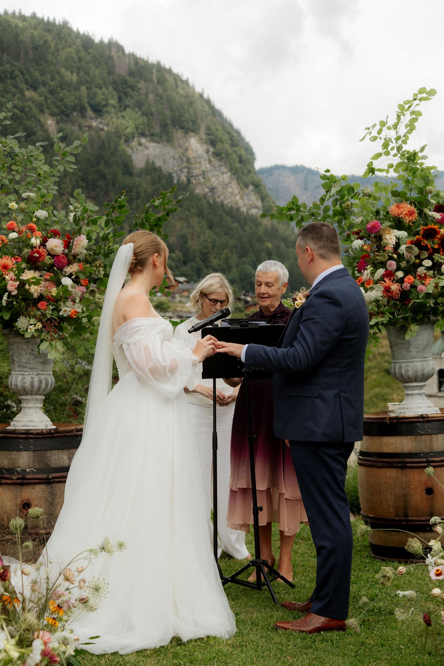 Morzine Wedding Photographer captures candid ceremony photo at French Wedding venue.Natural,honest &authentic storytelling. Morzine Wedding