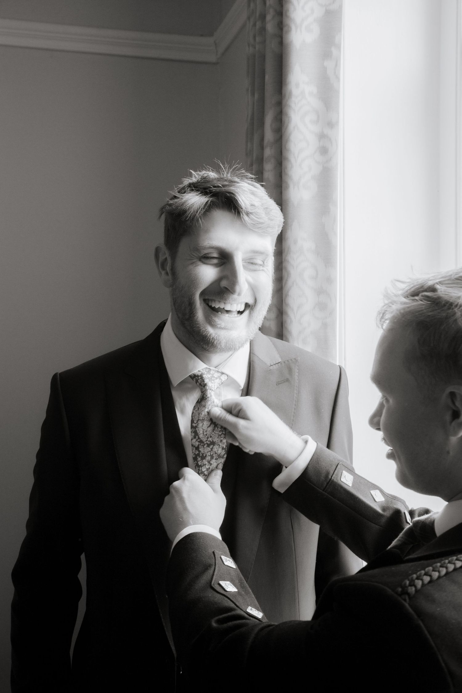 Documentary Style Cotswold Wedding Photographer captures groomsmen at Gloucestershire Wedding Venue.Natural,candid and timeless photography