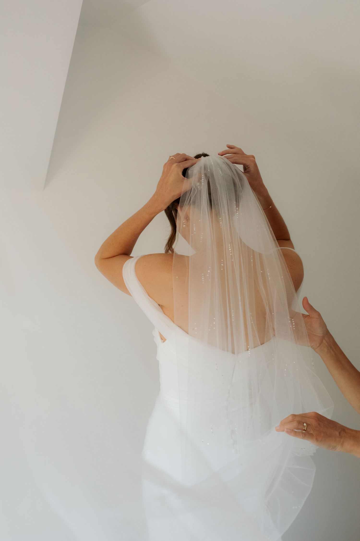 Morzine Wedding photographer captures intimate wedding morning details on Lake Montriond. Candid timeless documentary style photography.