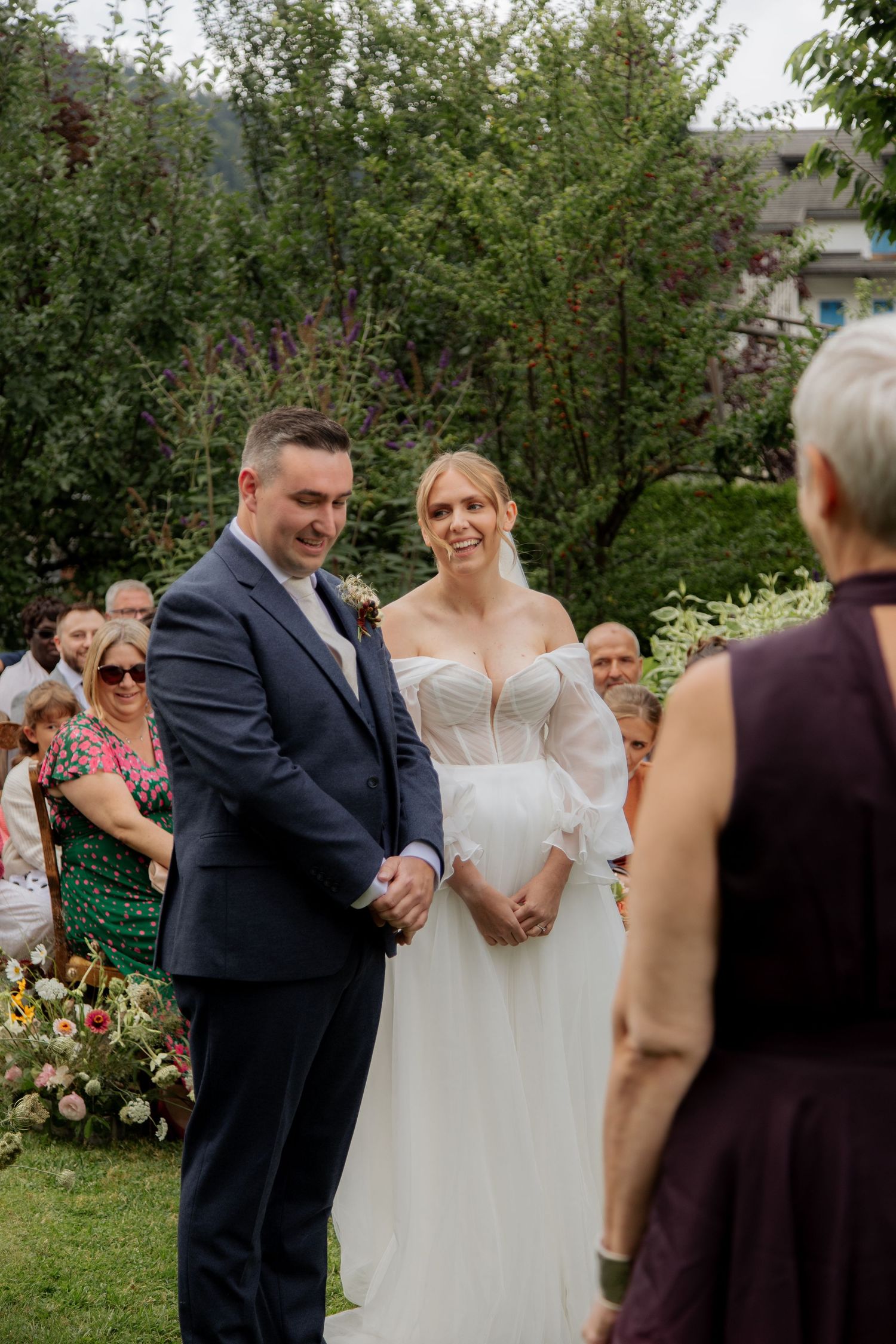 Morzine Wedding Photographer captures candid ceremony photo at French Wedding venue.Natural,honest &authentic storytelling. Morzine Wedding