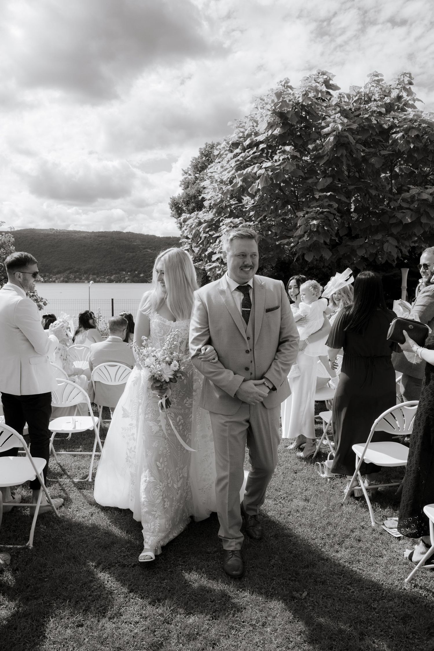 Annecy Wedding photographer captures epic wedding and natural couples photos on Lake Annecy in France. Candid & timeless documentary style.