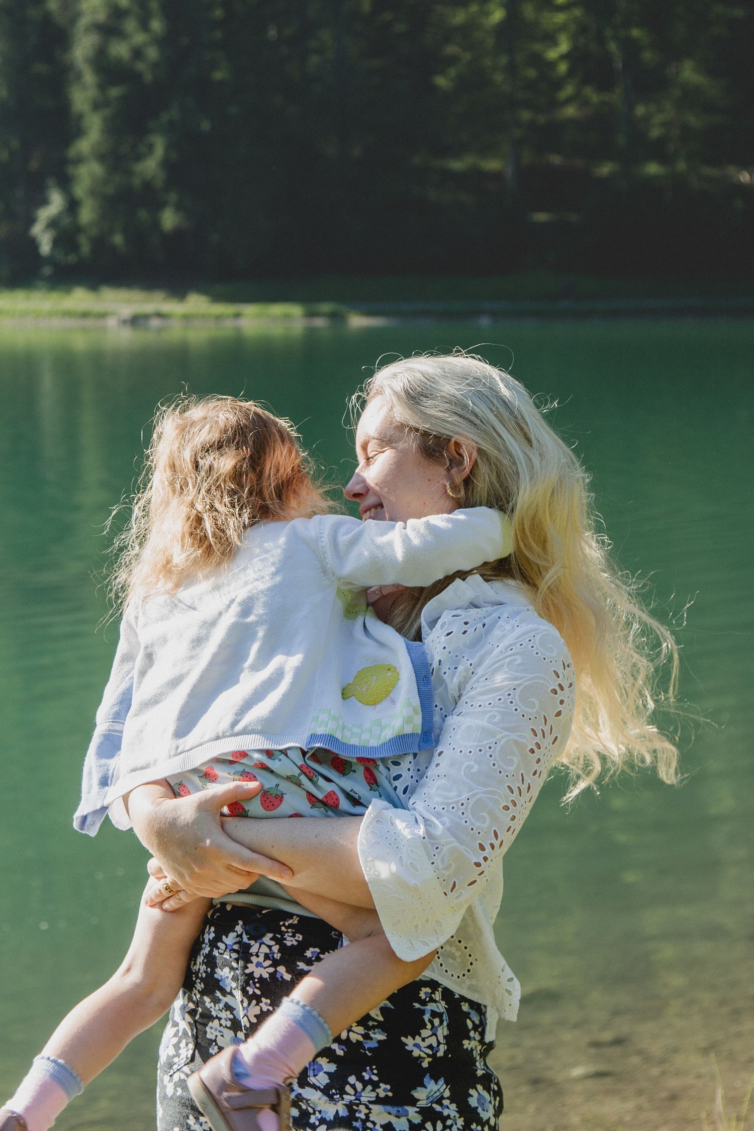 Family Photographer captures outdoor family photos. Family photography session captured by Morzine family Photographer at Lac Montriond