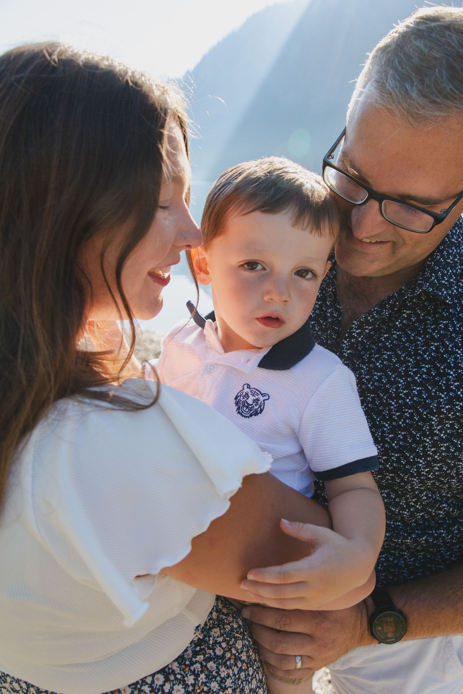 Outdoor family photography session next to Lake Montriond. Captured by Morzine Family photographer. Natural family portraits in morzine