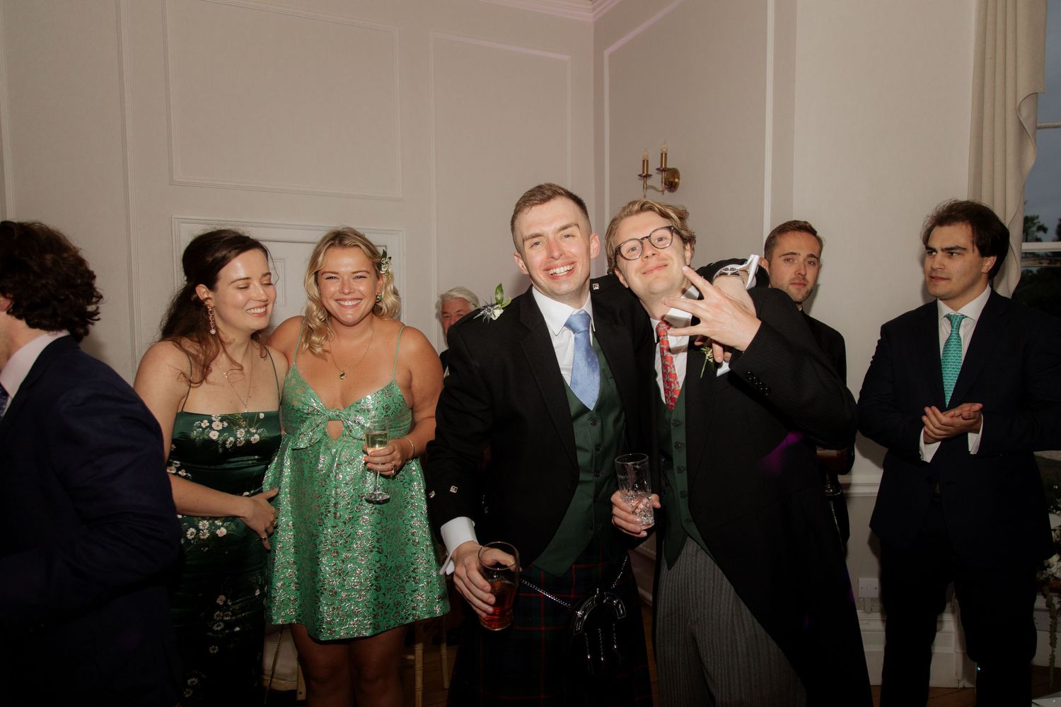 Documentary Style Cotswold Wedding Photographer captures wedding party at a Gloucestershire Wedding Venue. natural and candid wedding photos