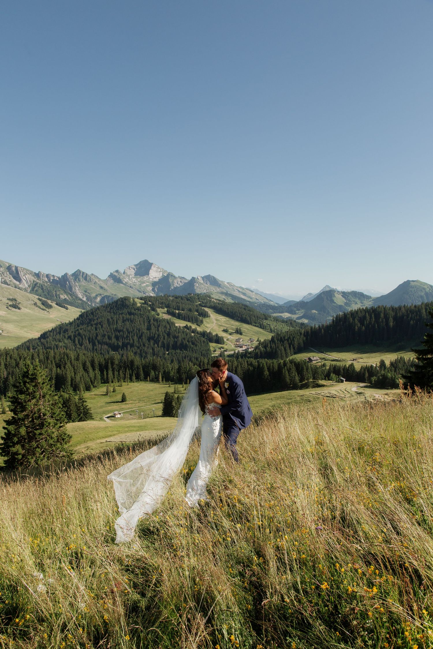 Morzine Wedding Photographer captures bride and groom photos in La Clusaz Wedding venue. French Mountain Wedding photographer. Outdoor Bride