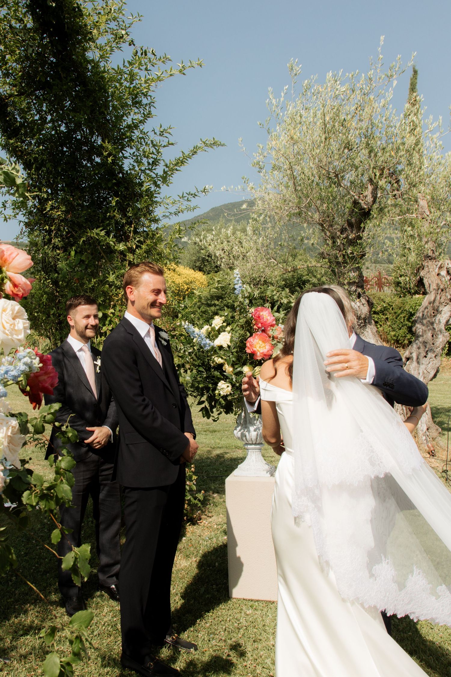 Assisi Wedding ceremony in Italy captured by destination wedding photographer, candid, natural style. Documentary style wedding photography.