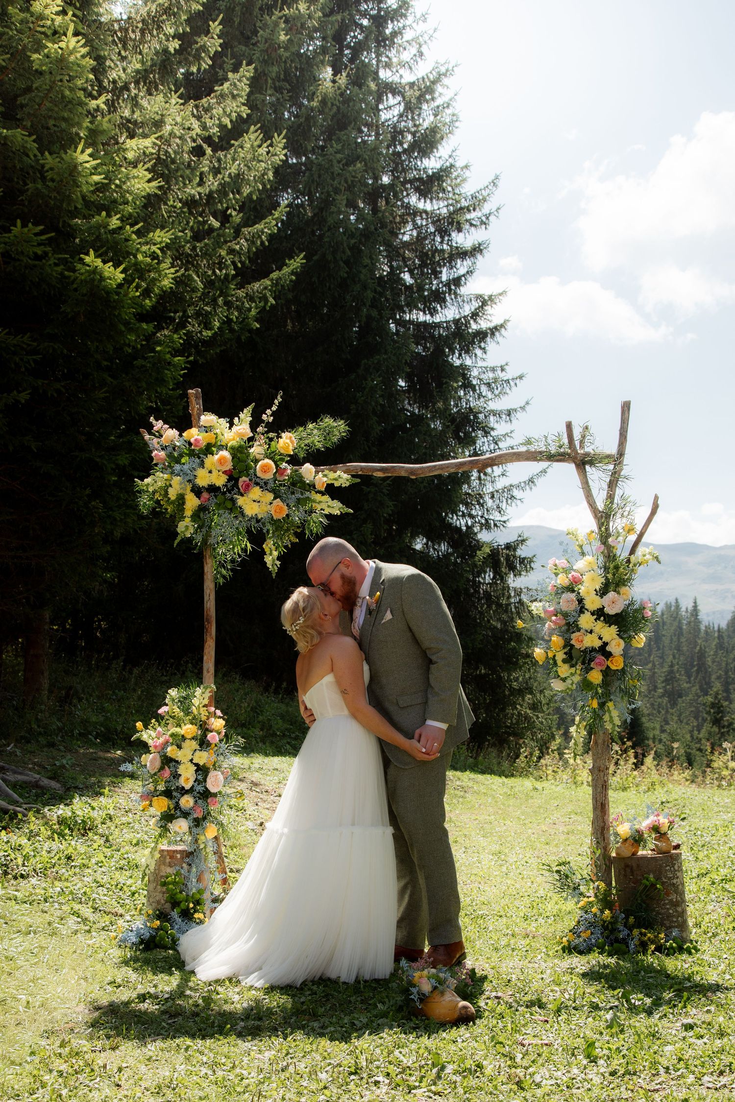 Morzine Wedding Photographer captures candid ceremony photo at Meribel Wedding venue.Natural,honest &authentic storytelling. Three Valleys