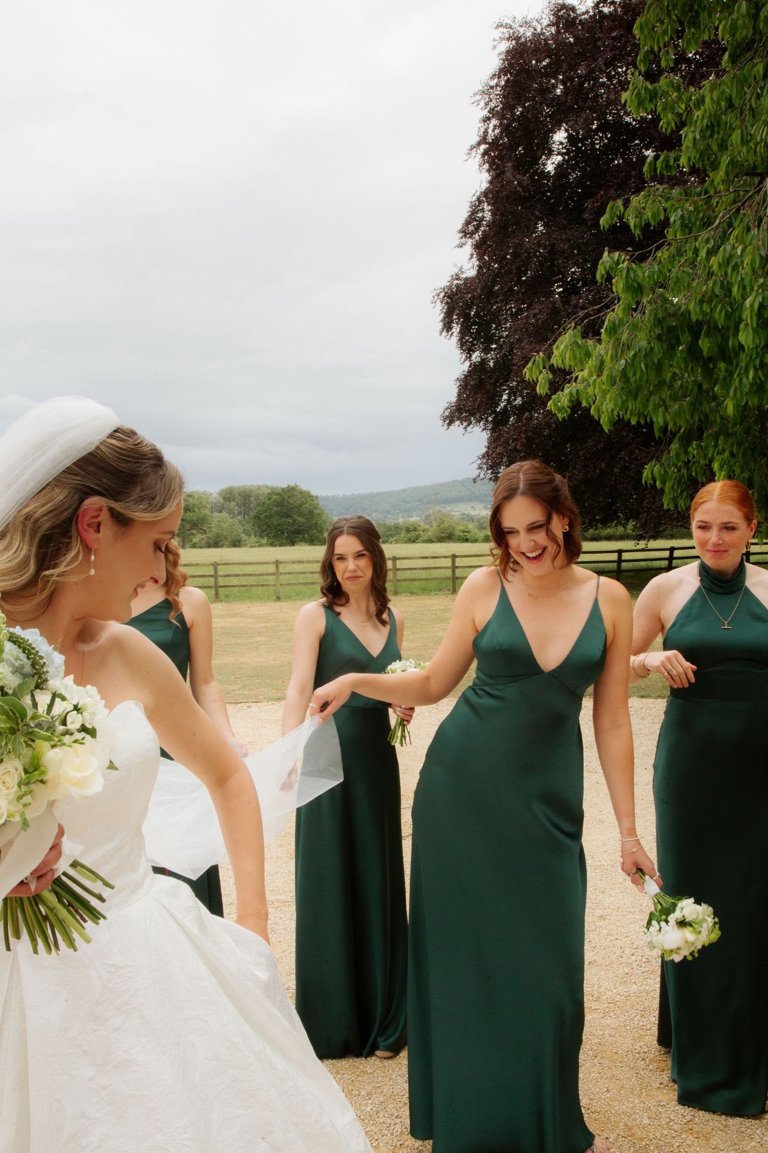 Candid Cotswold Wedding Photographer captures bridal party at Gloucestershire Wedding Venue. Natural, candid and timeless photography, UK