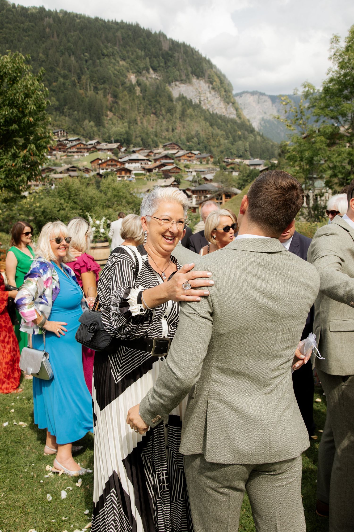 Documentary style Wedding Photographer captures wedding photos at Morzine Wedding venue. Natural, timeless and candid wedding photography.