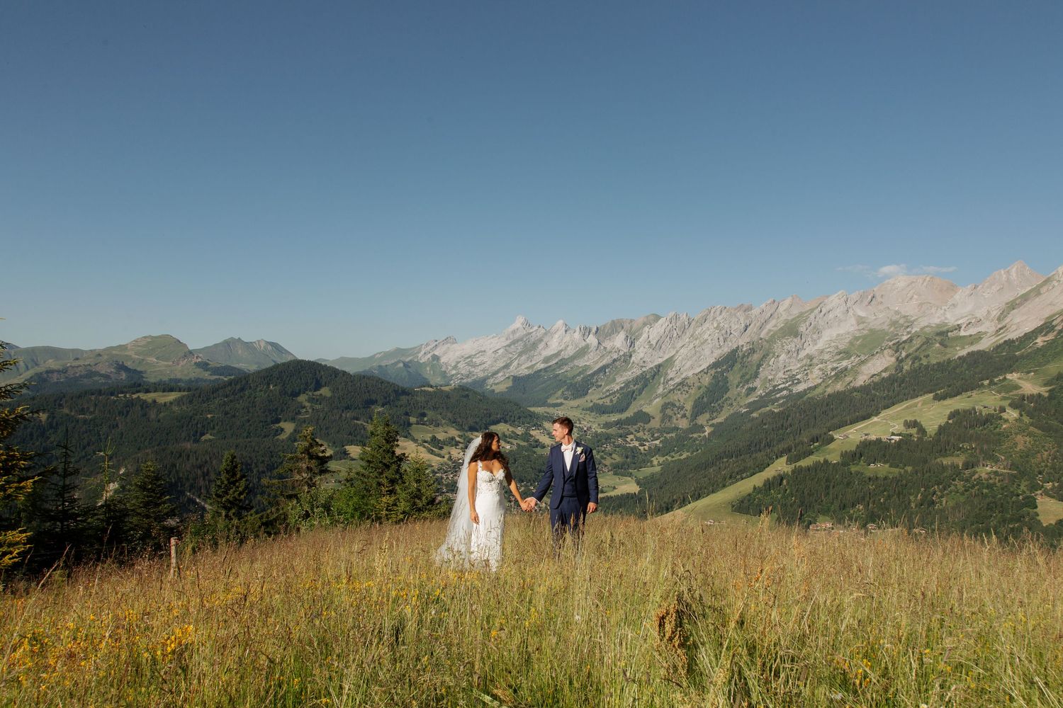 Morzine Wedding Photographer captures epic wedding photos in La Clusaz Wedding venue. French Mountain Wedding photographer. Outdoor Brides