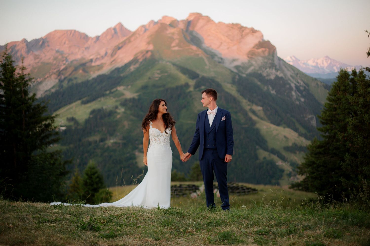 Wedding Photographer captures epic sunset wedding photos in La Clusaz Wedding venue. French Alps, Mountain Wedding photographer, europe.