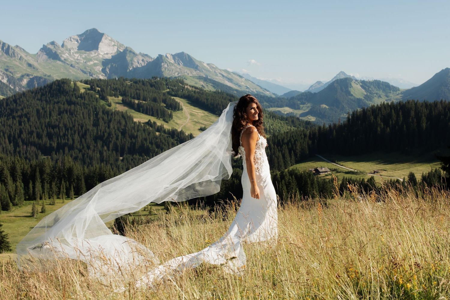Morzine Wedding Photographer captures bride and groom photos in La Clusaz Wedding venue. French Mountain Wedding photographer. Outdoor Bride