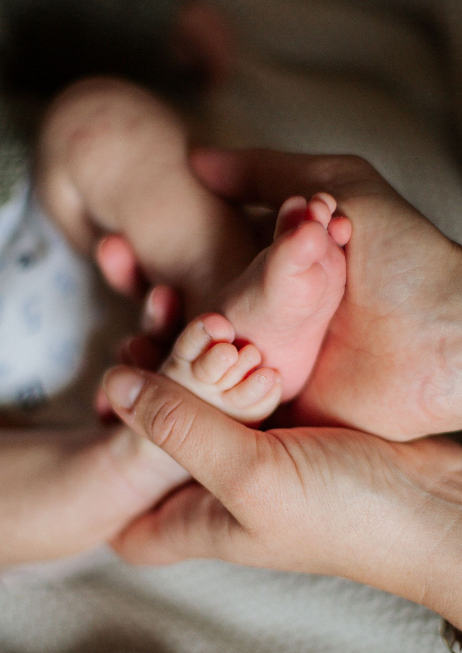 Newborn Photographer captures maternity photos of mother and baby. Newborn photography session captured by Morzine newborn Photographer