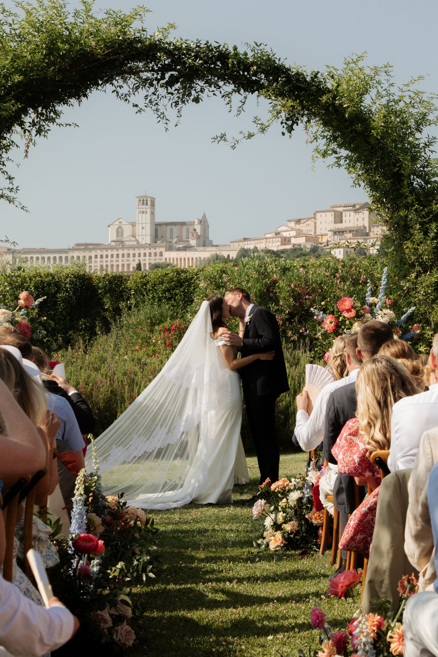 Italian Wedding photos in Assisi captured by destination wedding photographer, candid, natural style. Documentary style wedding photography.
