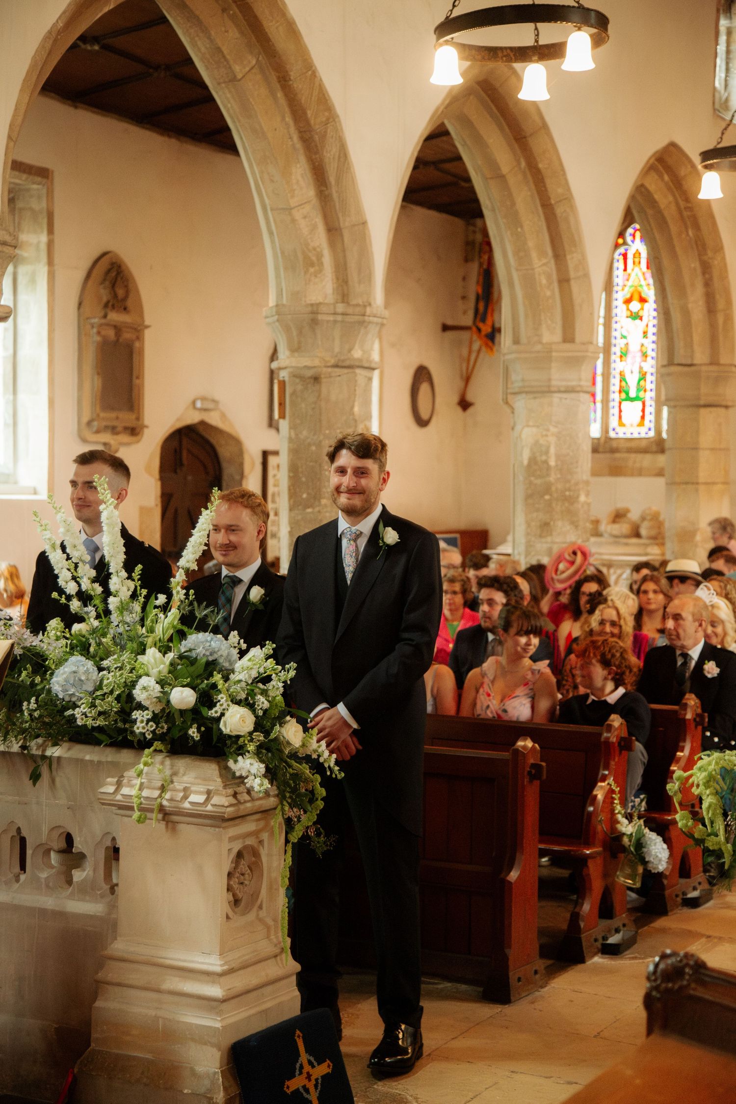Documentary Style Cotswold Wedding Photographer captures wedding confetti at Gloucestershire Wedding Venue.Natural,candid and timeless photo