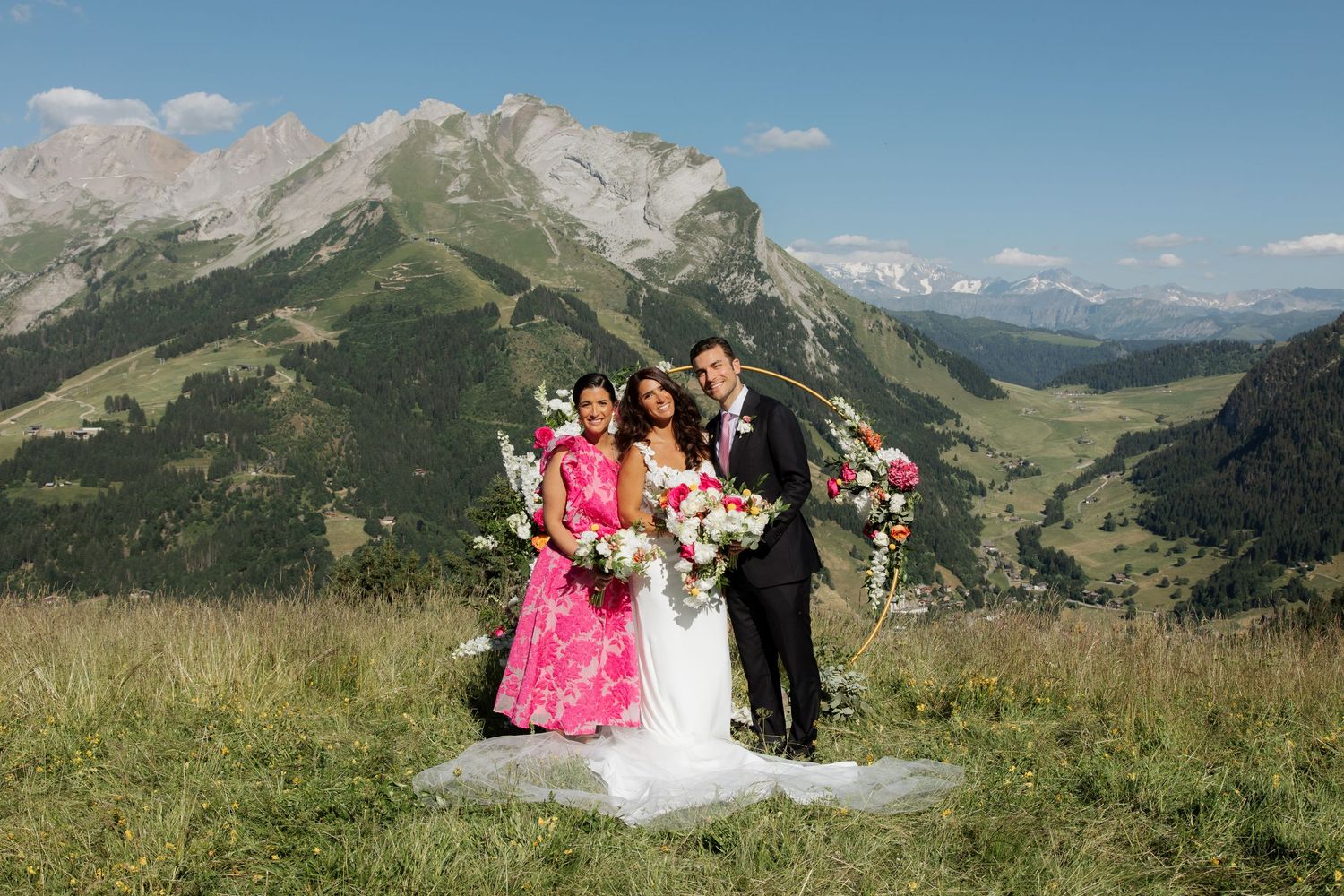 Morzine Wedding Photographer captures wedding ceremony photo at La Clusaz Wedding venue. French Mountain Wedding photographer. Outdoor Bride