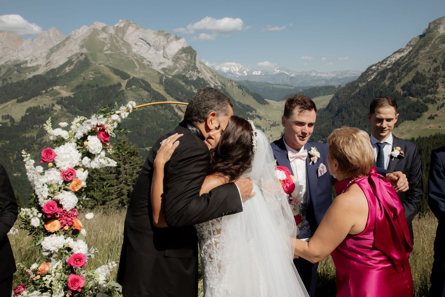European Wedding Photographer captures emotional wedding at La Clusaz Wedding venue. French Alps Mountain Wedding photographer.Outdoor Bride