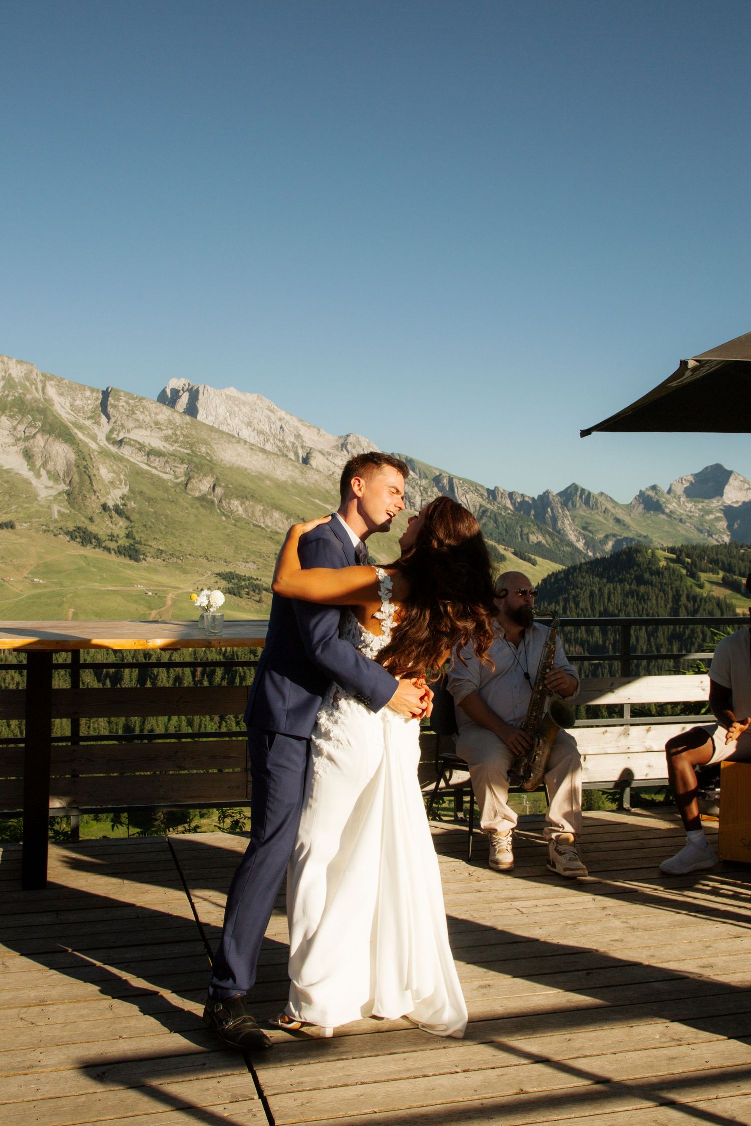 Morzine Wedding Photographer captures epic sunset wedding dinner in La Clusaz Wedding venue. French Alps, Mountain Wedding photographer.