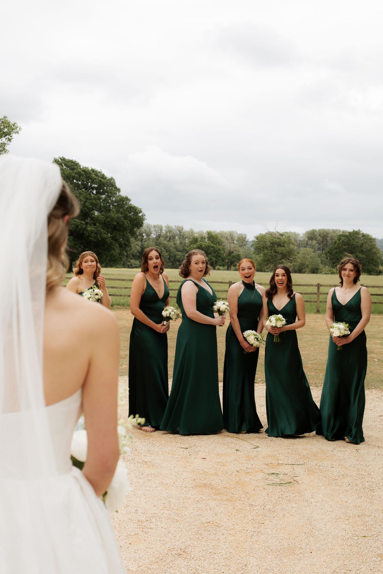 Candid Cotswold Wedding Photographer captures bridal party at Gloucestershire Wedding Venue. Natural, candid and timeless photography, UK