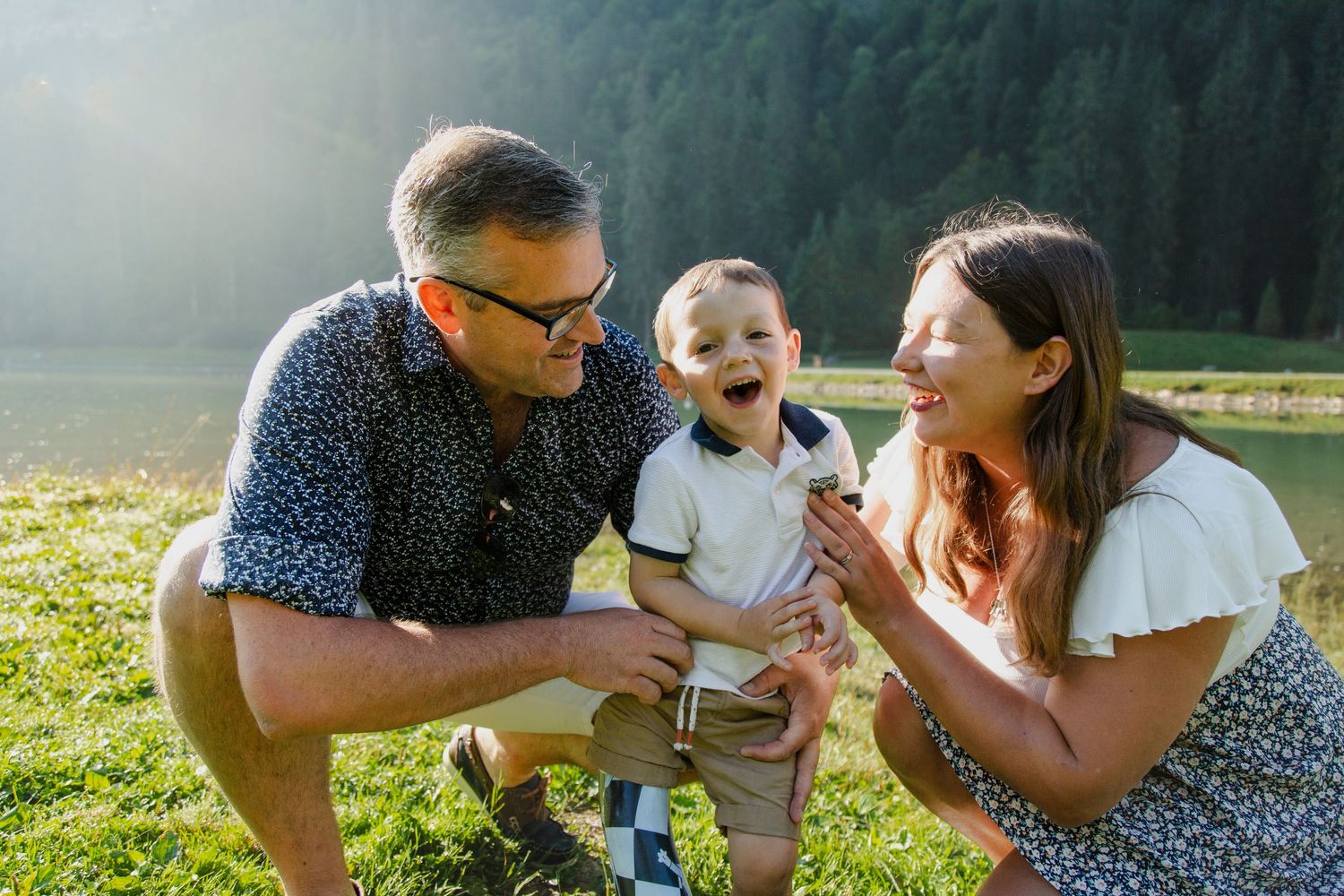 Outdoor family photography session next to Lake Montriond. Captured by Morzine Family photographer. Natural family portraits in morzine