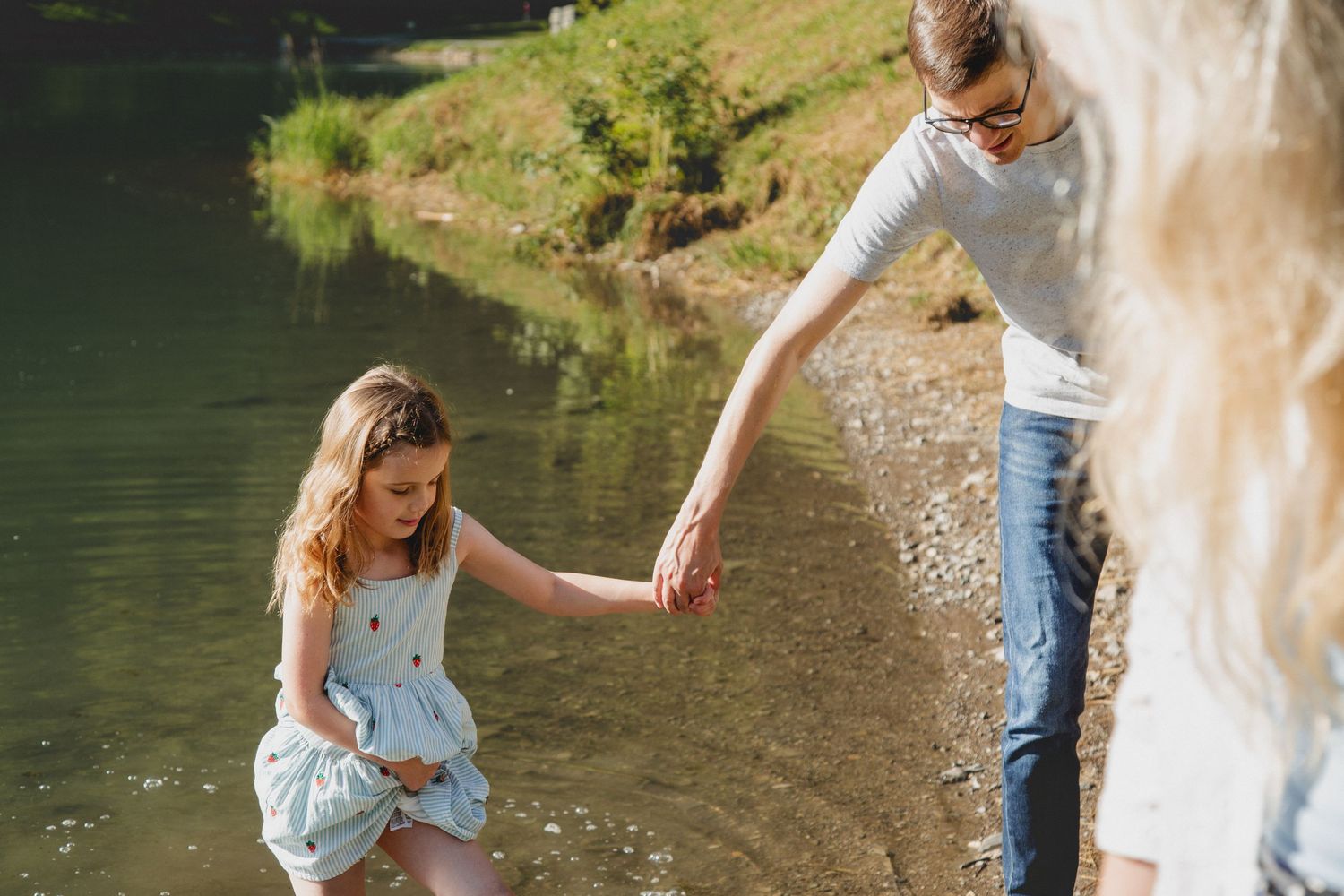 Family Photographer captures outdoor family photos. Family photography session captured by Morzine family Photographer at Lac Montriond