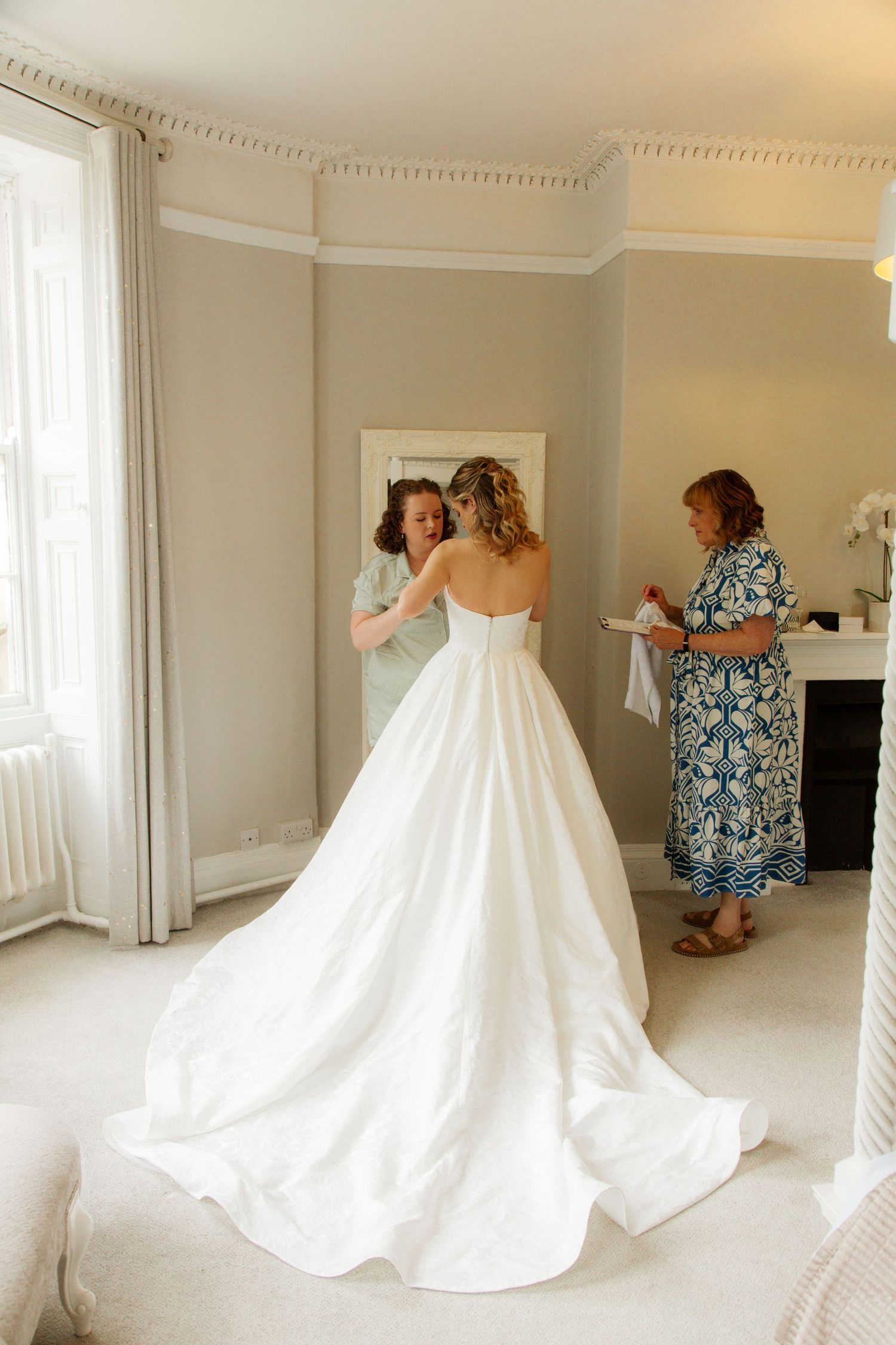 Candid Cotswold Wedding Photographer captures bridal party at Gloucestershire Wedding Venue. Natural, candid and timeless photography, UKCan