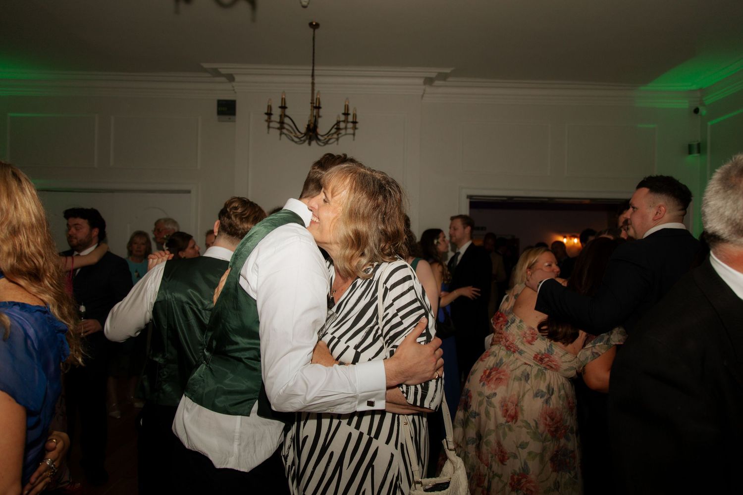 Documentary Style Cotswold Wedding Photographer captures wedding party at a Gloucestershire Wedding Venue. natural and candid wedding photos